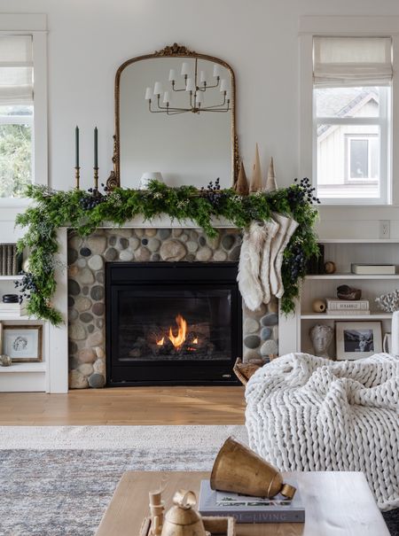 Get this cozy Christmas magic on your mantle. Achieve the look by blending timeless greenery, twinkling lights, and curated decor for a holiday haven that captivates the spirit of the season.

#LTKSeasonal #LTKhome #LTKHoliday