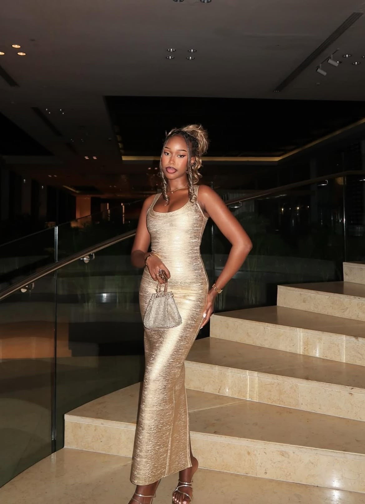 Long gold bandage dress 
Gold rhinestone bag

#LTKootd #LTKPetite #LTKBeauty