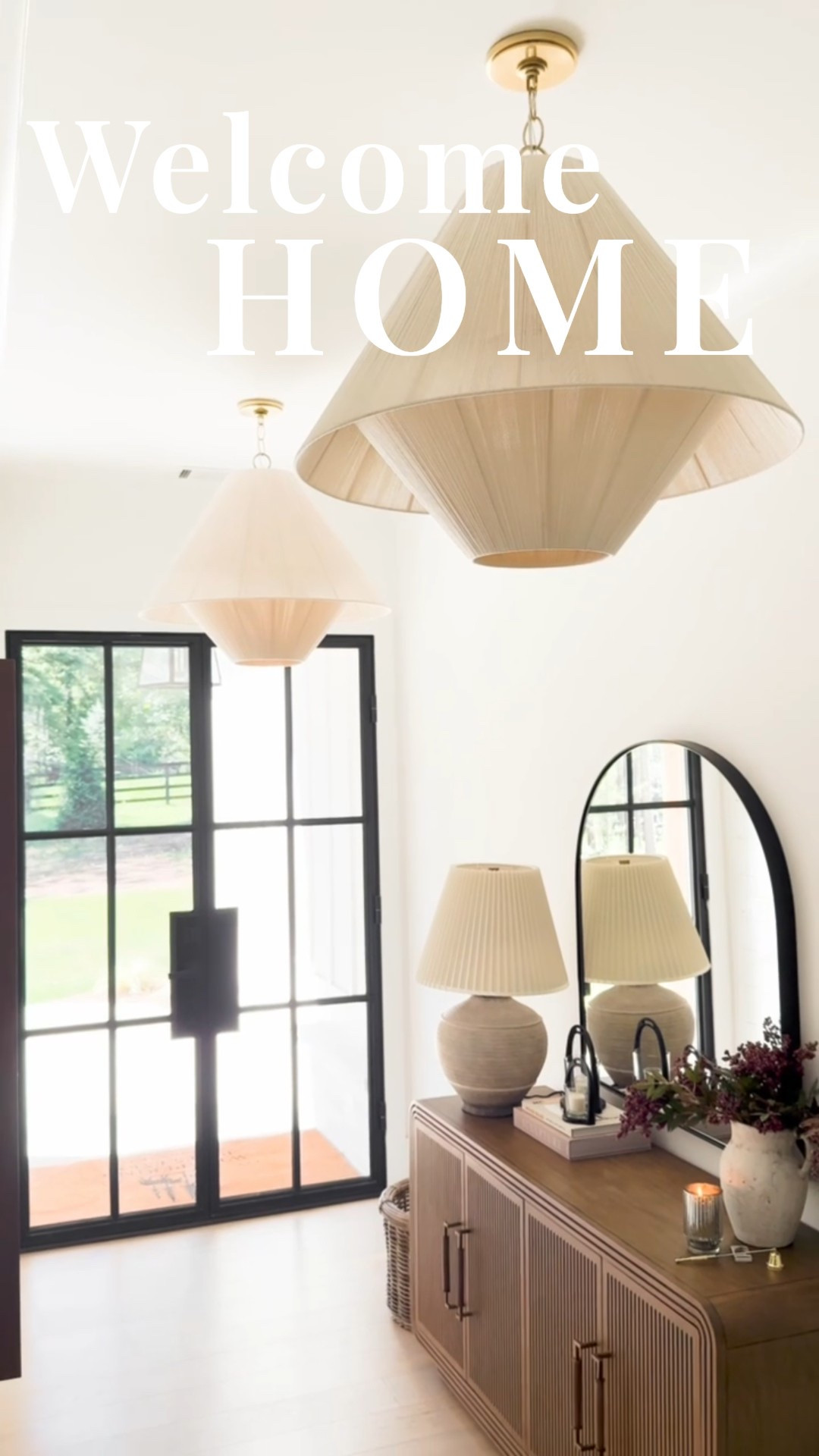 ✨ First impressions matter, and this entryway delivers. A sculptural console with textured wood, oversized statement pendants, neutral lamps, and natural floral accents set the perfect Modern Classic tone. 🌿🤍

Do you want to bring our dreamy Modern Classic style interior design into your own home? 🏡 You’re in luck! Reserve our Online Interior Design packages today -> https://porcheandco.com/edesign ✨ We can’t wait to work with you & design your home with #porcheandco

#EntrywayGoals #ModernClassicDesign #PorcheAndCo #HomeStylingInspo #ConsoleTableDecor #NeutralDecor #InteriorDesignLovers #FirstImpressions


#LTKStyleTip #LTKOver40 #LTKHome