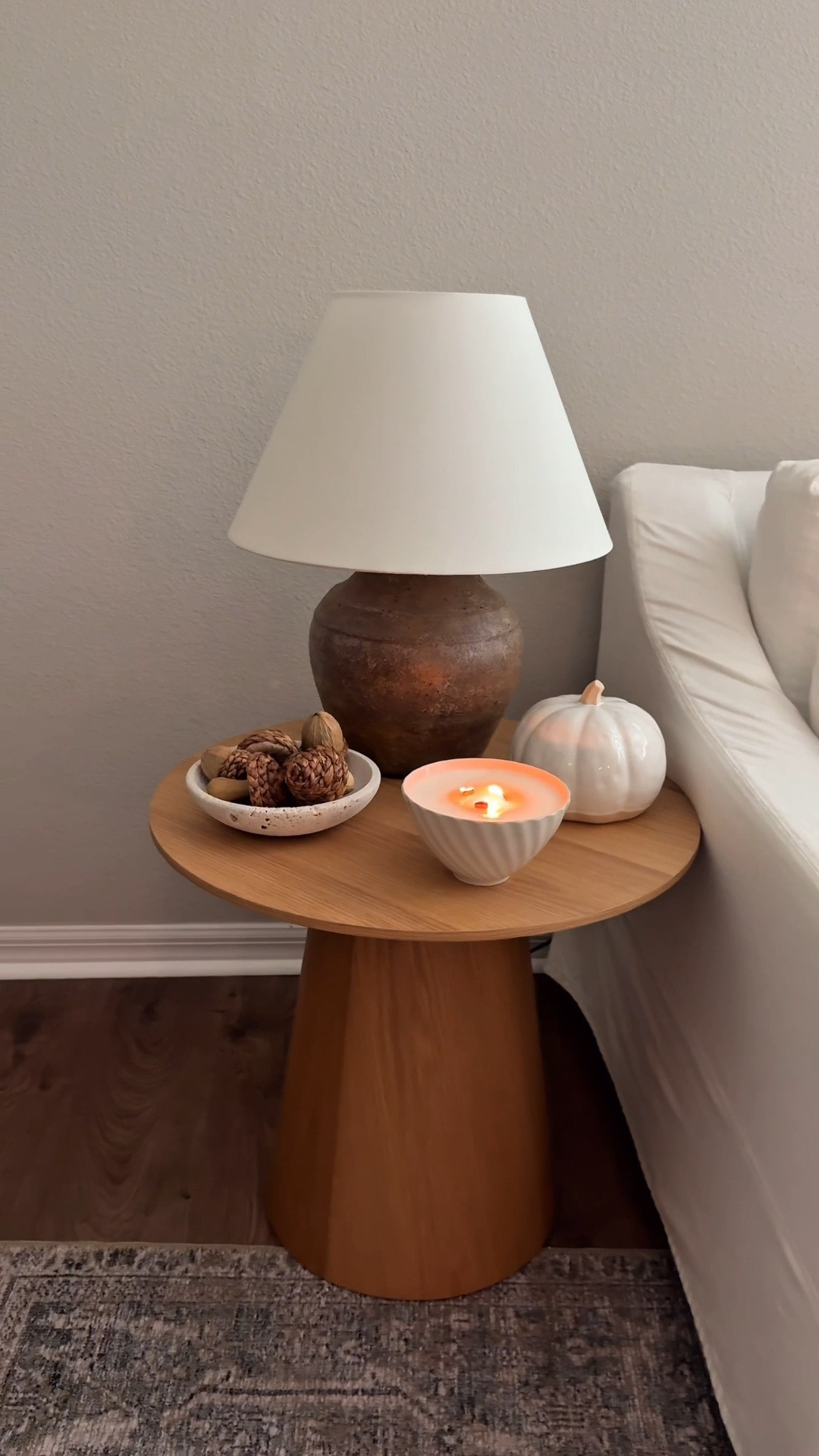 Earthy, neutral wooden side table styling.

#LTKHome #LTKSeasonal #LTKSaleAlert