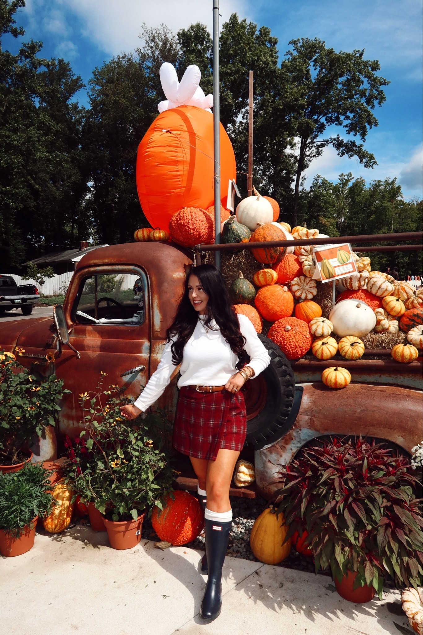 Amazon plaid pull on skort (medium), Amazon white sweater (medium), navy blue hunter boots, Amazon boot socks : a perfect fall activities look!