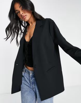 ASOS DESIGN jersey slouchy suit blazer in black | ASOS (Global)