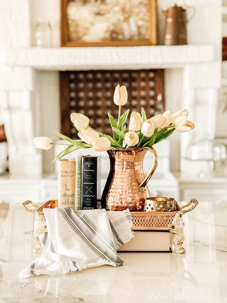 I thrifted this vintage footed brass and copper casserole tray and thought it would make a great centerpiece on my kitchen island! 

#LTKHome