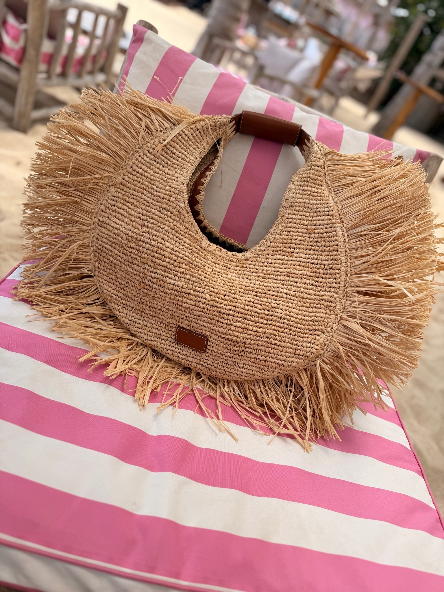 Obsessed with this #Staud #raffiatote! Wore it wide on vacation. Roomy and so stylish. Perfect for summer and all your island trips!

#summerbags #strawbags #raffiatote #raffiabags

#LTKSaleAlert #LTKSwim #LTKTravel