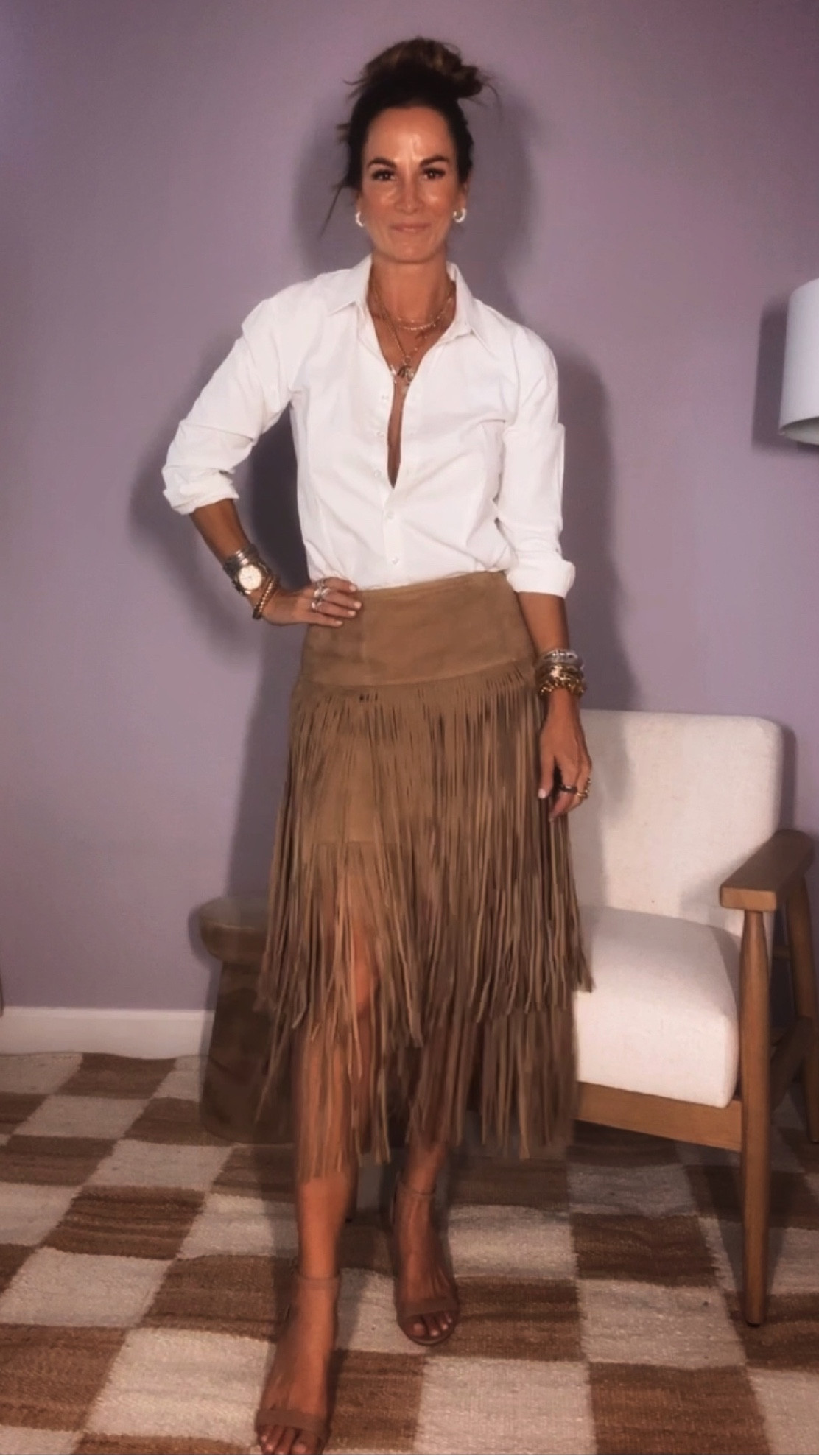 Fall, suede vibes in full effect 🍂 OBSESSED with this amazing fringe skirt paired with a crisp, white blouse 🤌🏼 

Outfit: Banana Republic 

🤌🏼 Pro Tip: Add a fun piece like a fringe skirt or statement jewels to add a spark to the ootd and it will also create different looks every time you style them ⚡️

🛍️ Linking in stories and my LTK in bio or shop the link below. 

#Summer #summerfashion #summerstyle #fashion #fringe #fashionblogger #fashionstyle #bikinislayer #bikinislayerbabe #bikinislayerstyle #bikinislaverlife #musthave #fall #suedeskirt #fallfashion #workwear #workstyle #bananarepublic #influencer #shop.LTK 

Suede skirt, Crisp white, tailored blouse,f ringe, Texture, suede, power skirt, summer trends, fall trends, fall style, button up top, outfit ideas, work wear outfit ideas, skirt, metallic bag, sparkly bag, minimal style, bright outfit, evening wear, minimal style, neutral chic


#LTKstyletip #LTKFind #LTKSeasonal