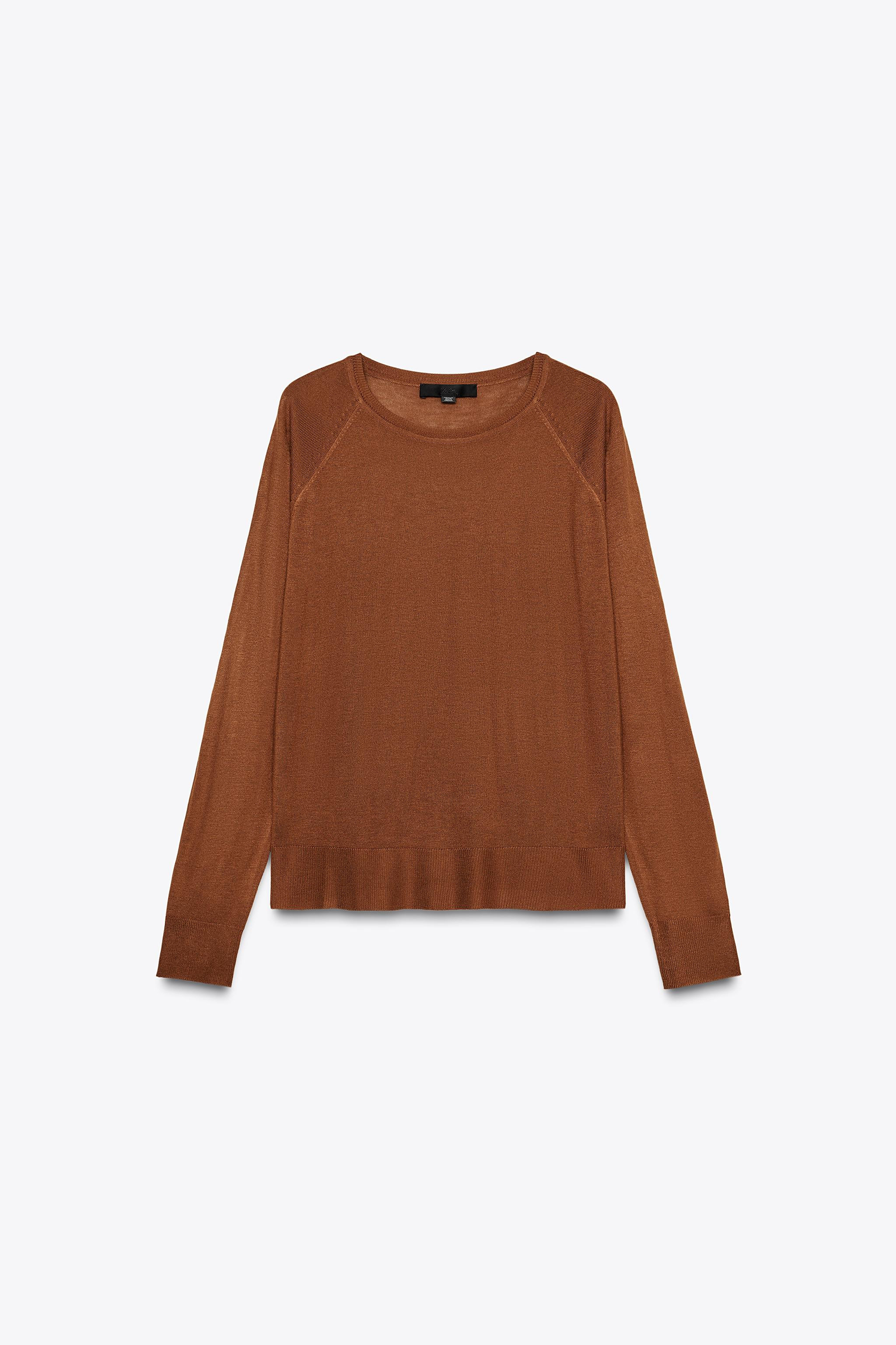 Plain round neck long sleeve sweater. Side slits at hem. Ribbed trim.Light brown | 1509/105/730Pr... | Zara US