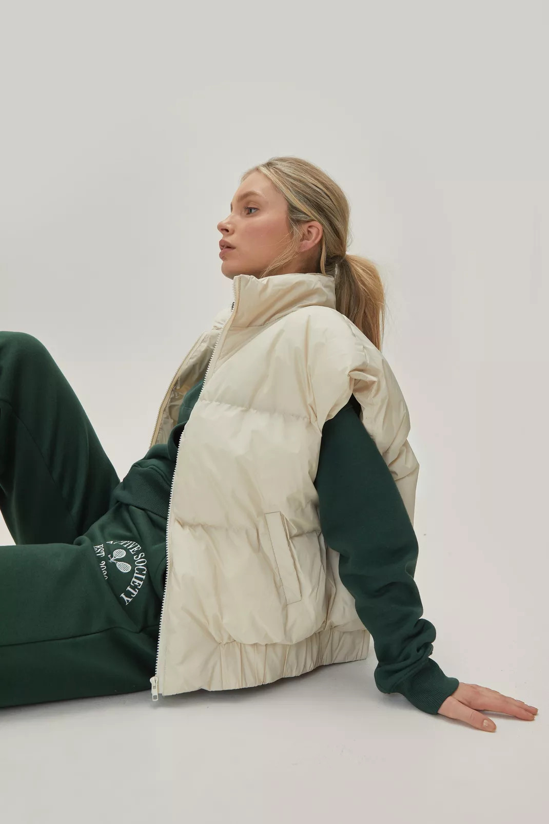 Padded Sleeveless High Neck Puffer Vest | Nasty Gal (US)