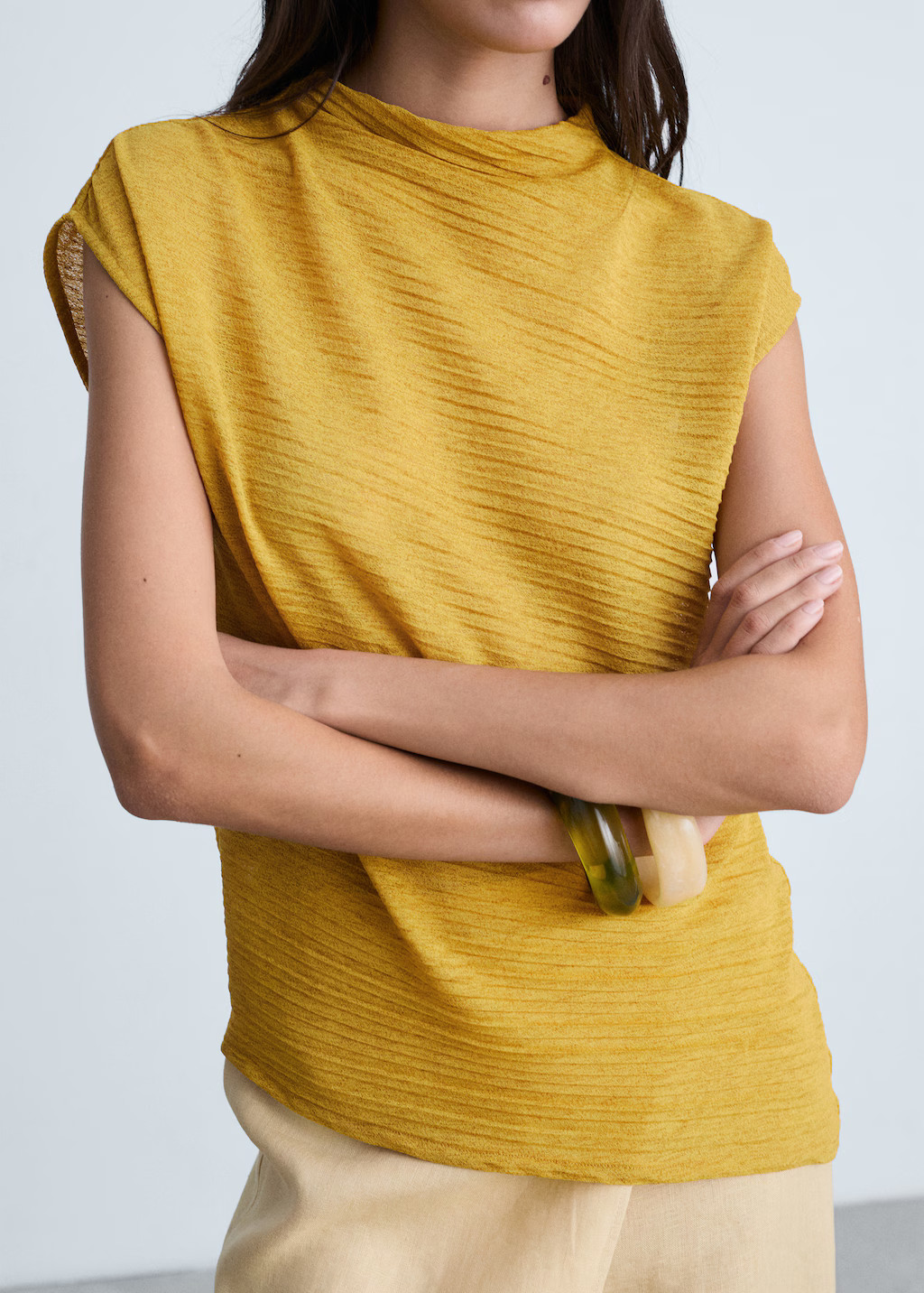 Asymmetrical textured top - Women | MANGO United Kingdom | MANGO (UK)