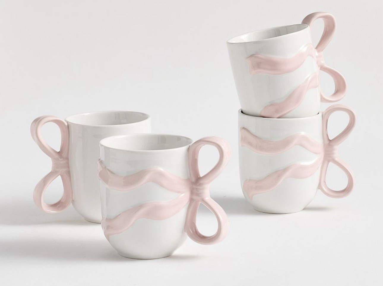 LOVESHACKFANCY BOW MUGS 
set of 4
These are needed to go with the pitcher!
So cute! Sipping some tea and feeling so feminine! Keep the set for yourself or split up and give as gifts!
