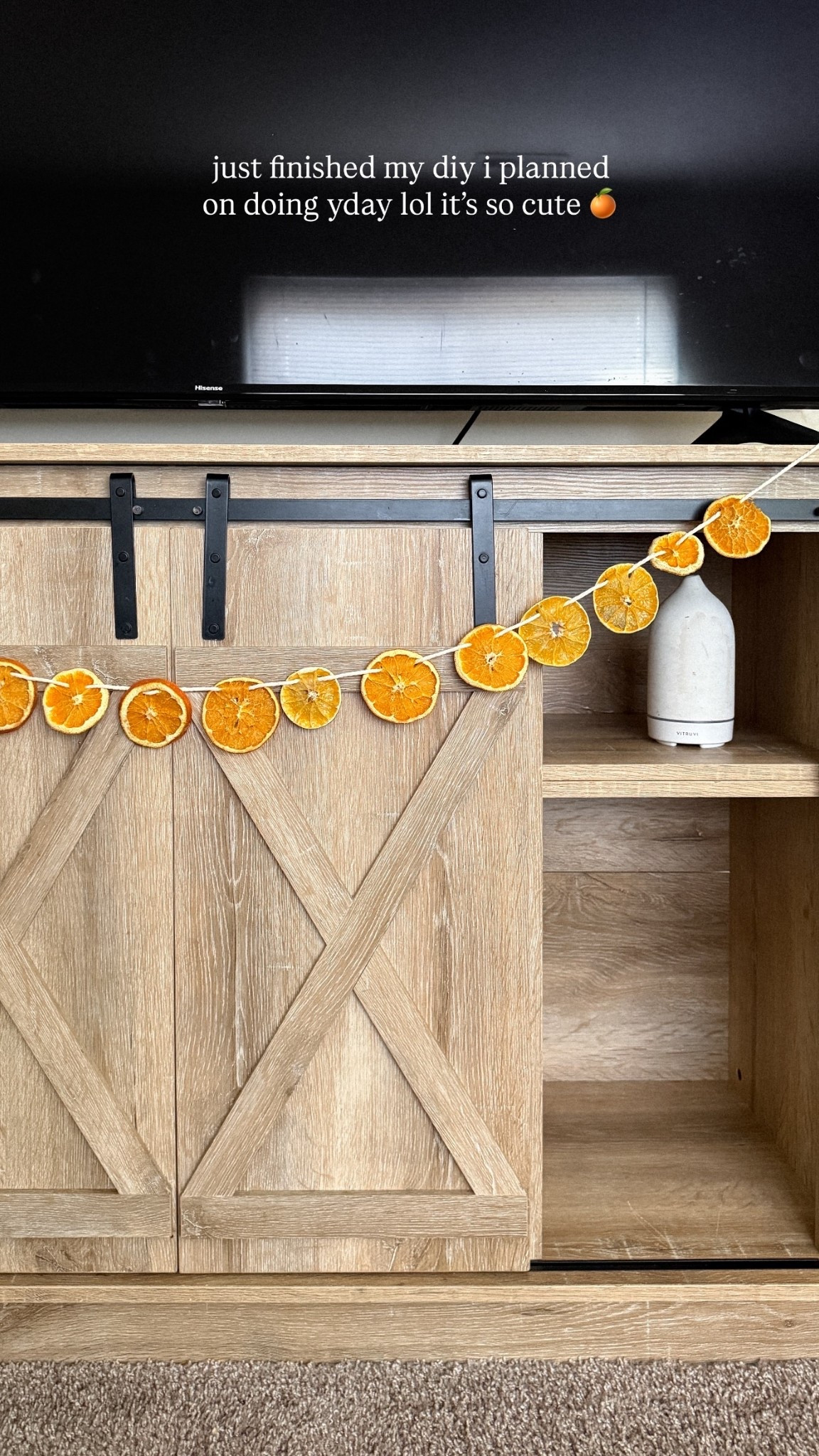just finished my diy i planned on doing yday lol it’s so cute 🍊

#orangegarland #garland #diy #tvstand 

#LTKCyberWeek #LTKHome #LTKHoliday