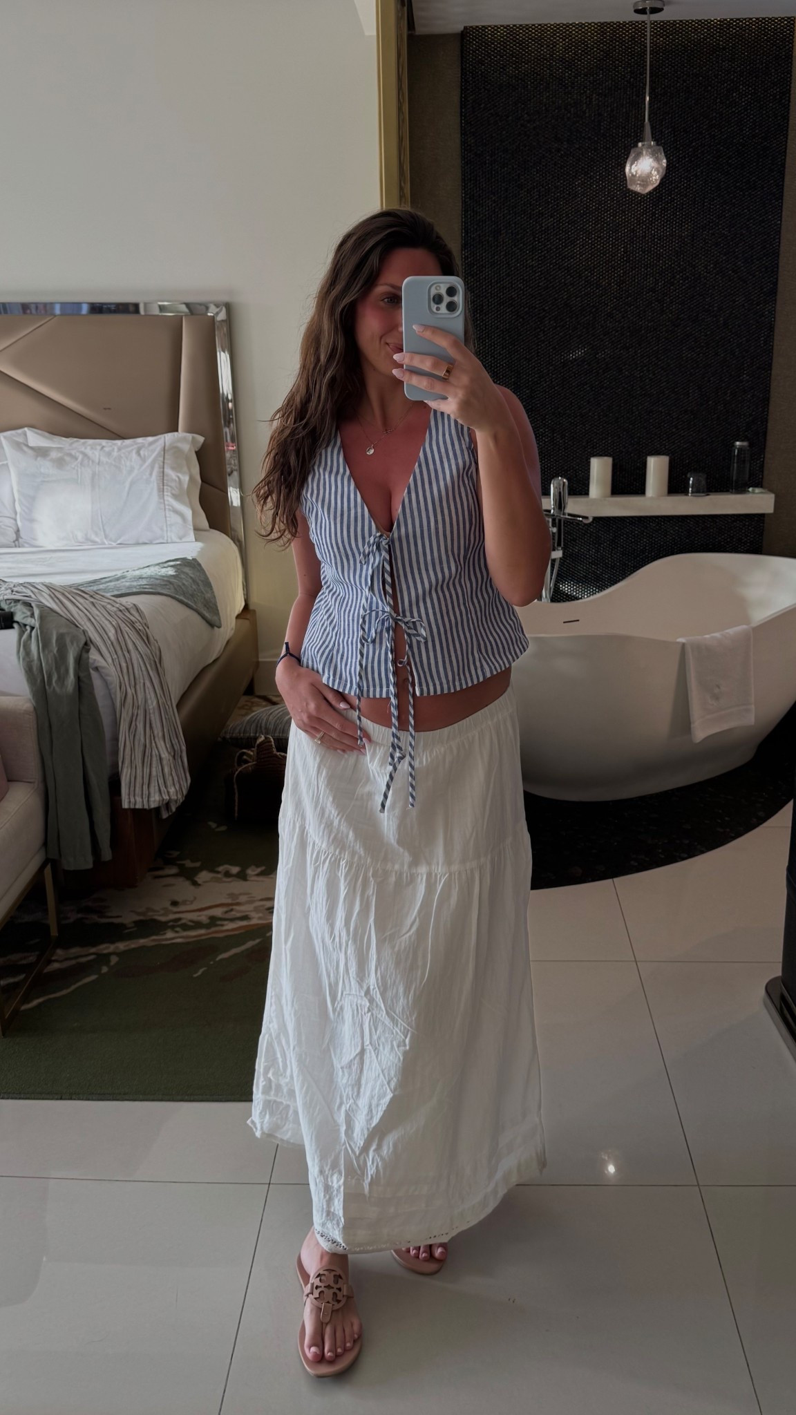 Everyone needs a good white maxi skirt 

#vacationoutfit #babymoon #maxiskirt 

#LTKBump #LTKootd #LTKSpringSale