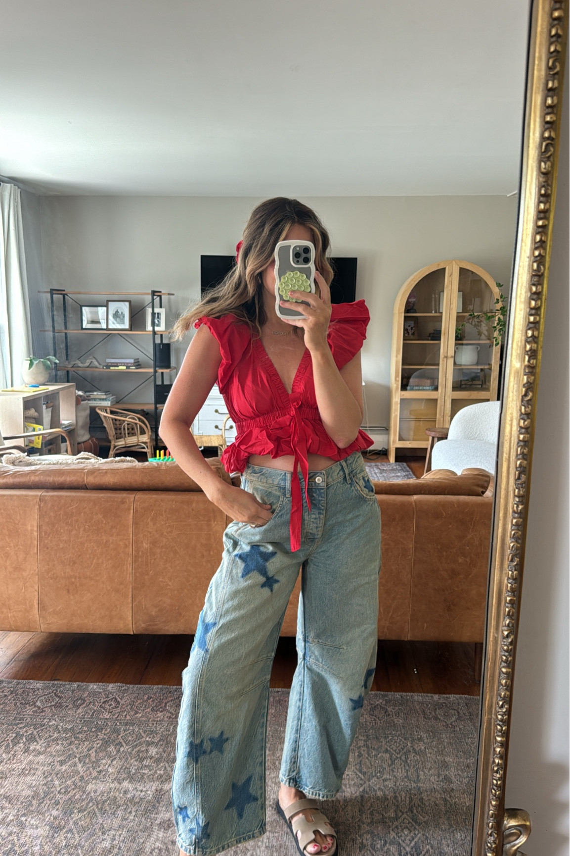 Everything about this outfit I love. This top is selling so fast. I got a size a small and I miss so impressed with how flattering it is especially for a deeper V-neck. I also love the puffy sleeves.

The jeans run true to size. These are a size 28 but I could also probably do a 27. 

My ballet flats are at true to size and so are the sandals

Summer outfit, summer outfits, Fourth of July, Fourth of July outfit, Fourth of July style, red top, denim jeans, Free People style, Free People outfit

#LTKOver40 #LTKStyleTip #LTKSeasonal