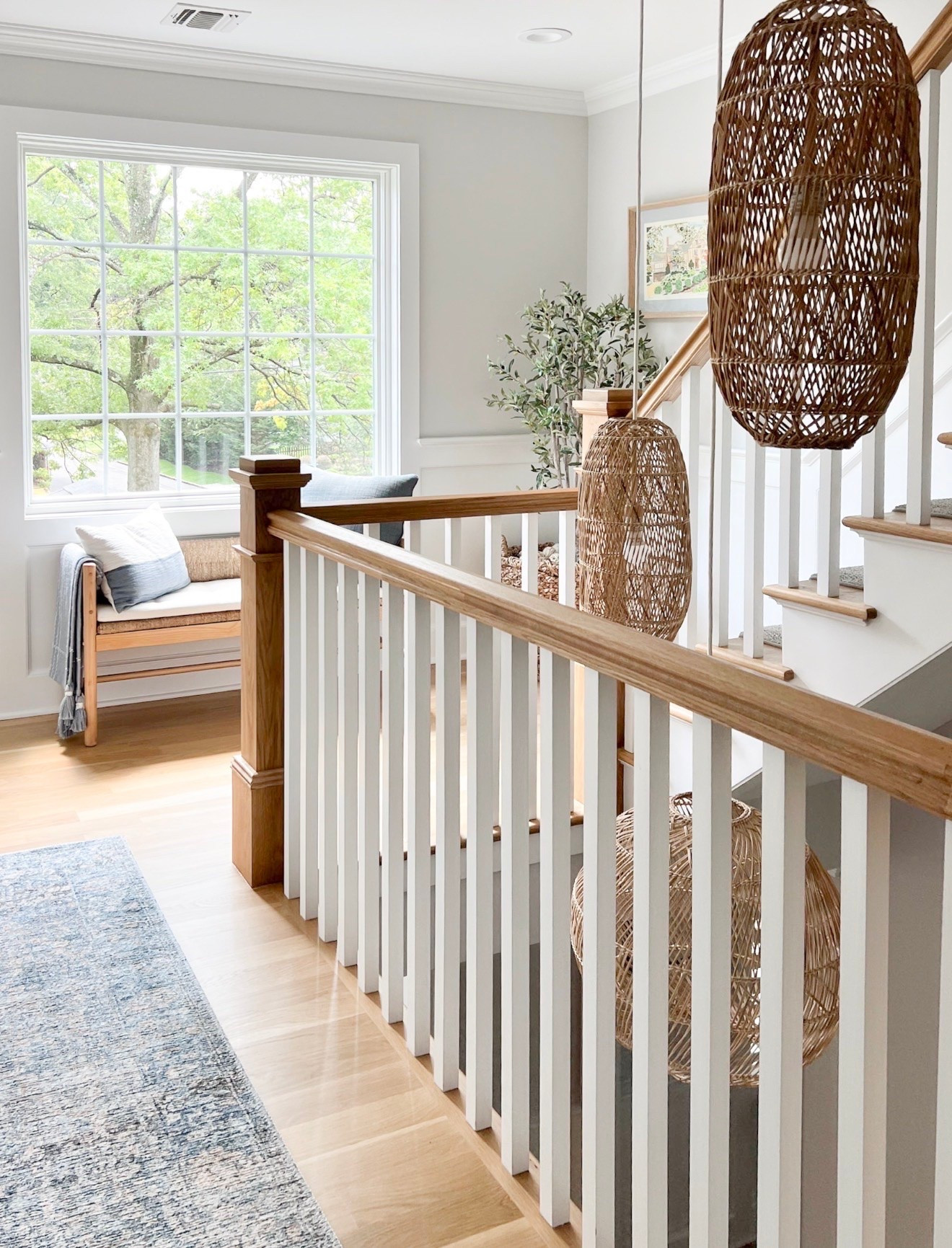 These woven pendant lights completely transformed this stairwell. I love how they add warmth, texture, and visual interest to a space that is often overlooked. Statement lighting is one of my favorite ways to make a home feel custom, and these fixtures prove that functional spaces can be beautiful too.

statement lighting, woven pendants, stairwell lighting, coastal home, natural textures, home decor, interior design, lighting inspiration, foyer lighting, woven lighting, girlonthehudson

#LTKHome #LTKSeasonal