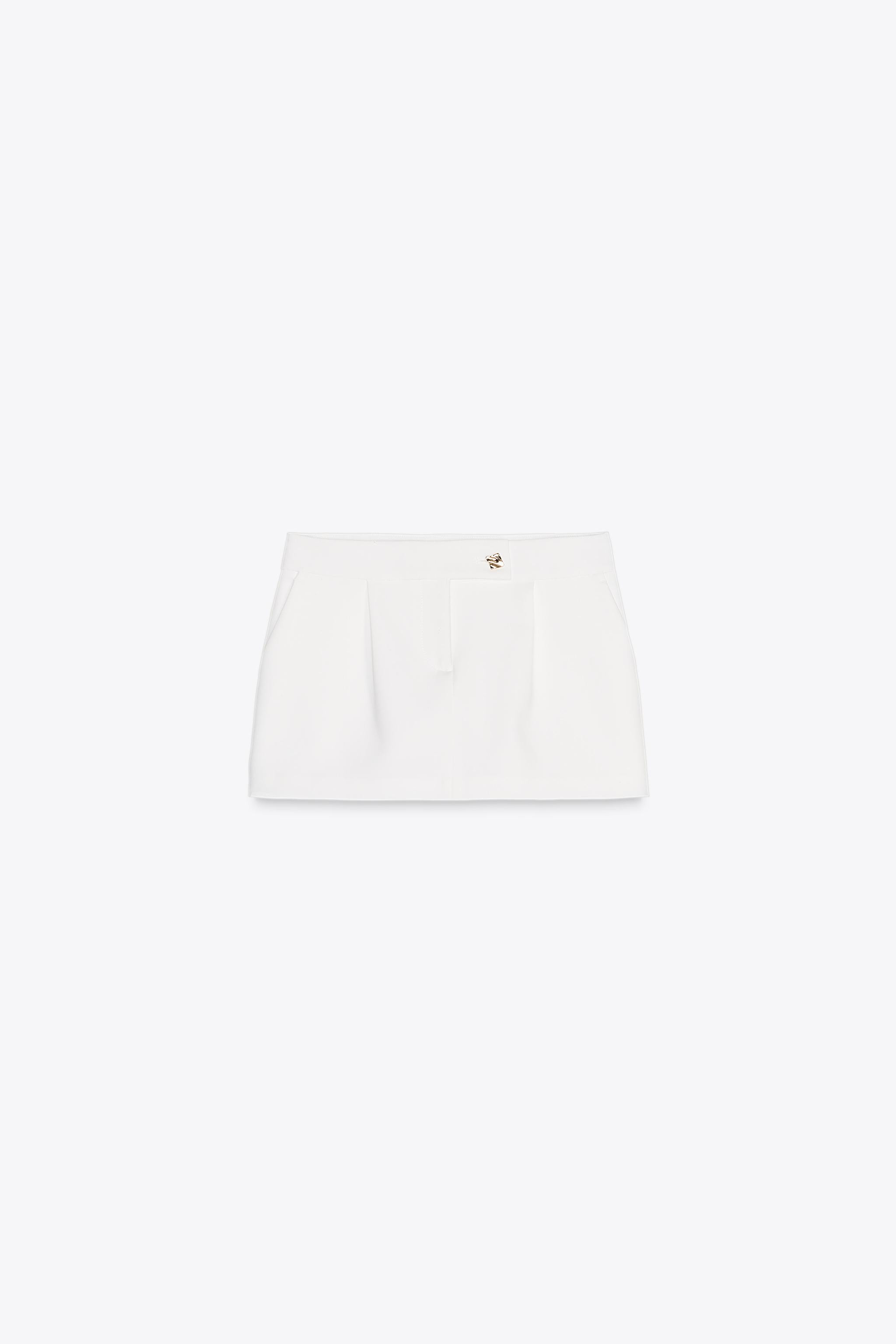 Low-rise skort with front pleats. Front pockets and a back false welt pocket. Front zip and butto... | Zara US