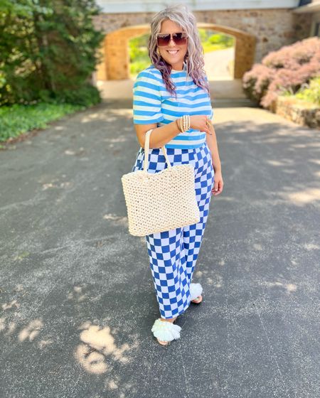 ✨SIZING•PRODUCT INFO✨
⏺ Blue-Gray Checkered Straight Leg Sweatpants with Ruffle Hem & Raw Edge •• XL •• TTS •• Target
⏺ Blue and White Striped Boxy Tee •• M, runs big •• Target 
⏺ Tan Woven Tote Bag •• Target 
⏺ Square Modern Oversized Sunglasses •• Amazon
⏺ Fringe & Pom Pom Slides •• linked similar 
⏺ Statement Rings •• Walmart & Amazon
⏺ Braided Hoop Earrings •• Versona 
⏺ Bracelet Stack with Braided Boho Bracelets •• Victoria Emerson (older) but linked other options

👋🏼 Thanks for stopping by!

📍Find me on Instagram••YouTube••TikTok ••Pinterest ||Jen the Realfluencer|| for style, fashion, beauty and…confidence!

🛍 🛒 HAPPY SHOPPING! 🤩


#target #targetfinds #founditattarget #targetstyle #targetfashion #targetoutfit #targetlook #walmart #walmartfinds #walmartfind #founditatwalmart #walmart style #walmartfashion #walmartoutfit #walmartlook  #amazon #amazonfind #amazonfinds #founditonamazon #amazonstyle #amazonfashion checkered, checkered outfit, checkered print, fun print, mixing prints, checkered pattern, checkered clothing, mixing patterns, checkered outfit inspo, checkered outfit inspiration, checkered fashion, checkered style, checkered shirt, checkered pants, checkered boots, black and white checkered, vans, checkered bag, checkered purse, checkered jacket, checkered coat, checkered accessories #pattern #print #checkered #square #check  Boho, boho outfit, boho look, boho fashion, boho style, boho outfit inspo, boho inspo, boho inspiration, boho outfit inspiration, boho chic, boho style look, boho style outfit, bohemian, whimsical outfit, whimsical look, boho fashion ideas, boho dress, boho clothing, boho clothing ideas, boho fashion and style, hippie style, hippie fashion, hippie look, fringe, pom pom, pom poms, tassels, california, california style,  #boho #bohemian #bohostyle #bohochic #bohooutfit #style #fashion 
#under10 #under20 #under30 #under40 #under50 #under60 #under75 #under100
budget fashion, affordable fashion, budget style, affordable style, curvy style, curvy fashion, midsize style, midsize fashion


#LTKsalealert #LTKunder50 #LTKcurves