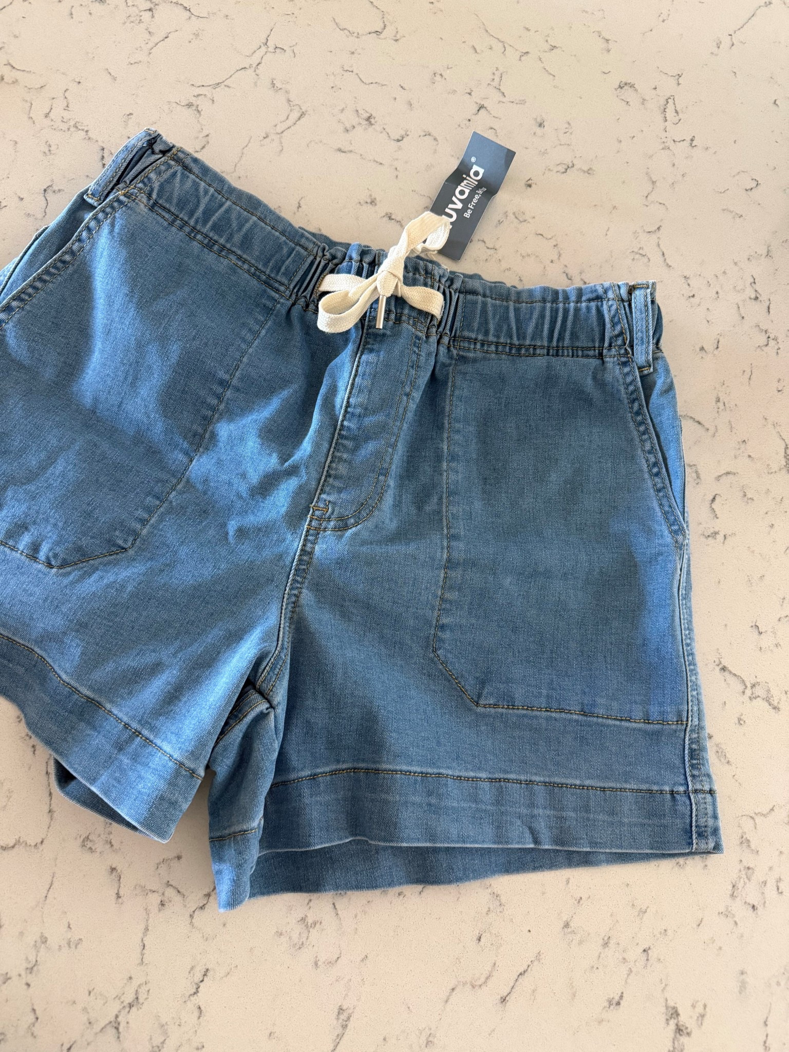 Wanted to love these so bad because the style is genuinely really cute and they actually feel well made, but the sizing was very off for me. I ordered a large and they were literally skin tight, so I would definitely need an XL or even XXL to make them work. Posting them here in case anyone’s interested because I do think they have potential, but I personally think they run small and would be really careful with sizing.
—

Amazon jean shorts, elastic waist jean shorts, women’s denim shorts, Amazon denim shorts, high waisted jean shorts, pull on jean shorts, elastic waist shorts, casual summer shorts, women’s summer denim, postpartum shorts, mom style shorts, Amazon fashion finds, women’s casual shorts, cute denim shorts, comfy jean shorts, stretchy waist denim shorts, easy summer outfit, relaxed fit jean shorts, summer mom style, Amazon clothing finds, denim shorts for women, casual everyday shorts, pull on denim shorts, women’s summer outfit, postpartum fashion finds

#LTKmomlife