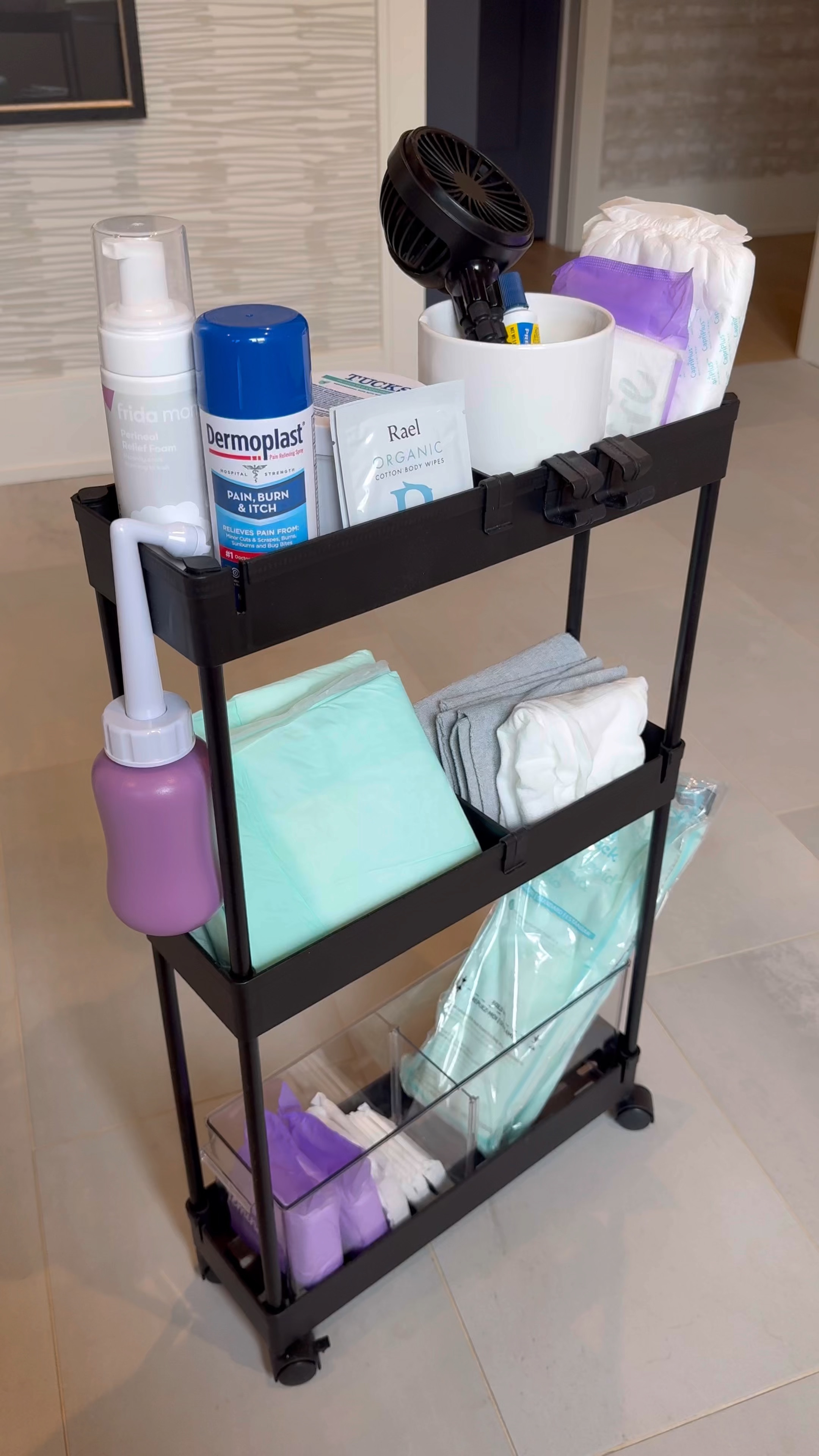 My postpartum cart I keep in my bathroom! The Rael pads I linked are AMAZING. Super long, but not too wide/thick. The Frida peri bottle, Tucks, and Frida underwear are my other favorites!

#LTKWatchNow #LTKBump #LTKBaby