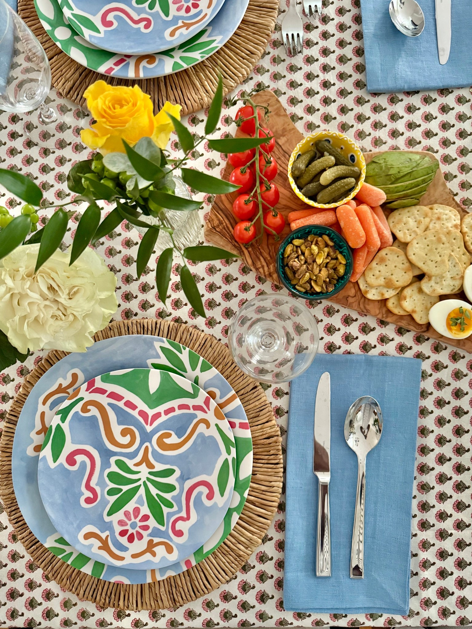 Pattern overload! Love these beautiful printed plates against the block print tablecloth. Summer tablescape - summer table decor - table setting - Tablescape ideas

#LTKParties #LTKHome #LTKOver40