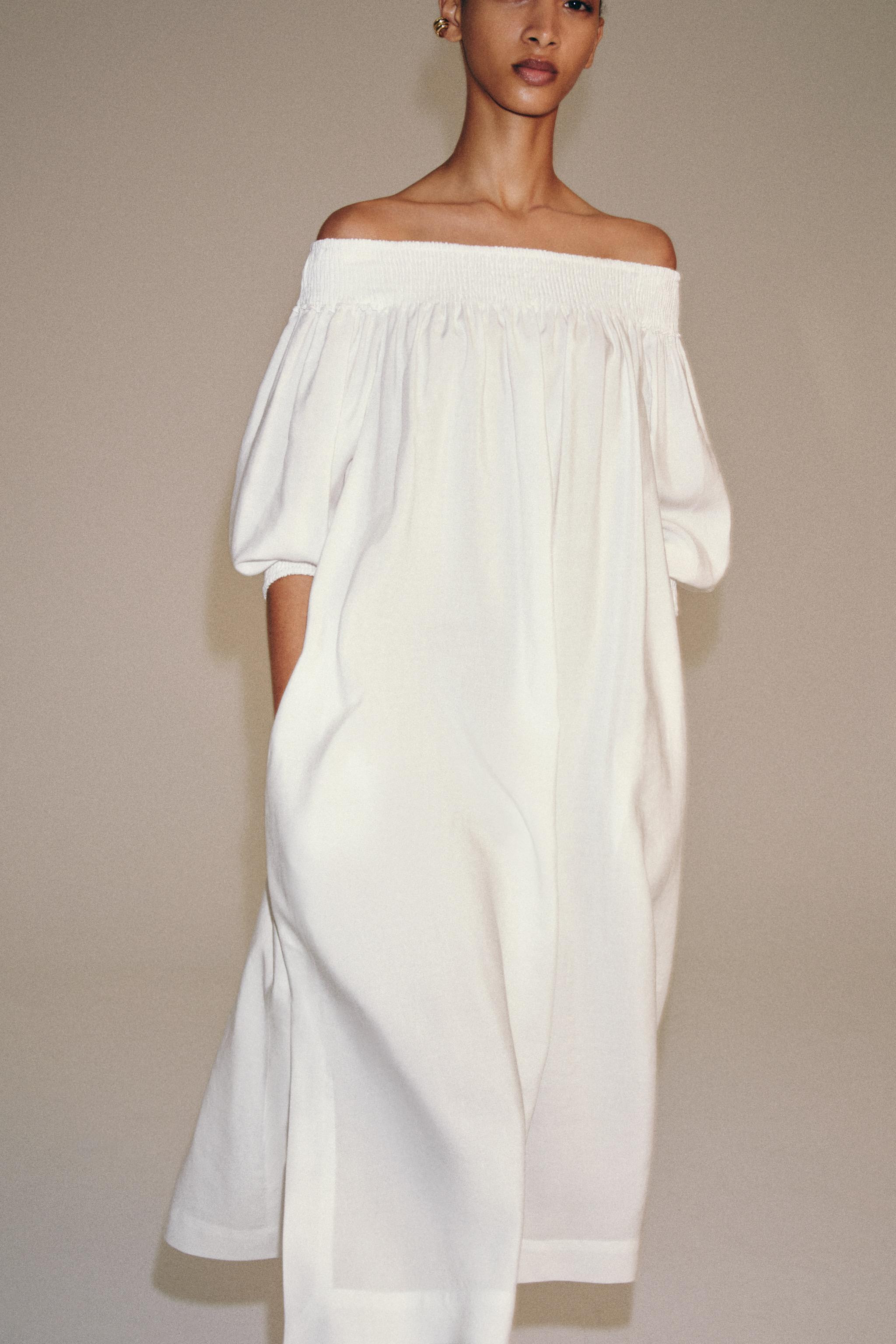ZARA WOMAN COLLECTIONMidi dress made with 25% linen yarn. Straight neckline and long sleeves with... | Zara US