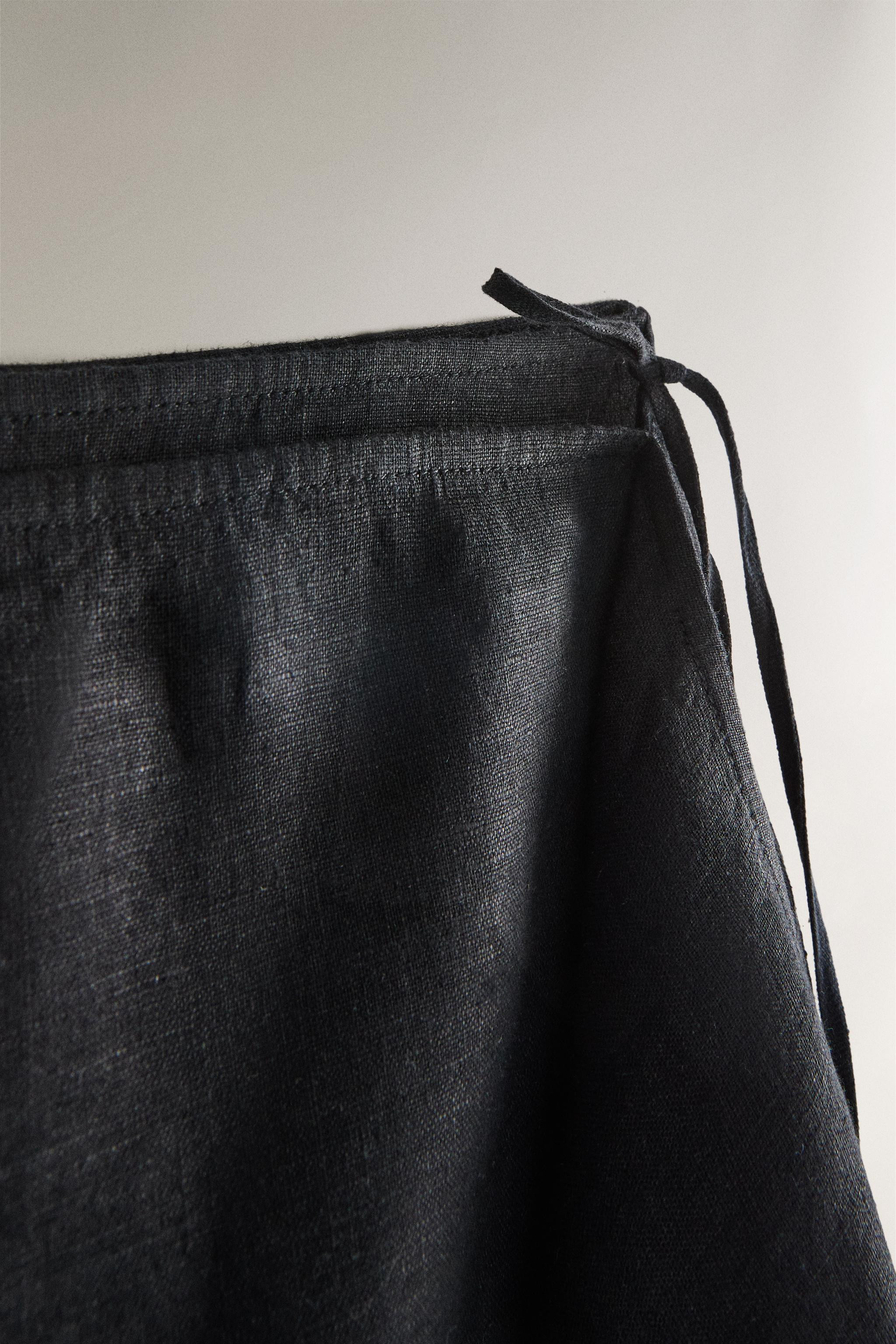 Plain linen beach sarong with wrap-style fastening at the side. | Zara US