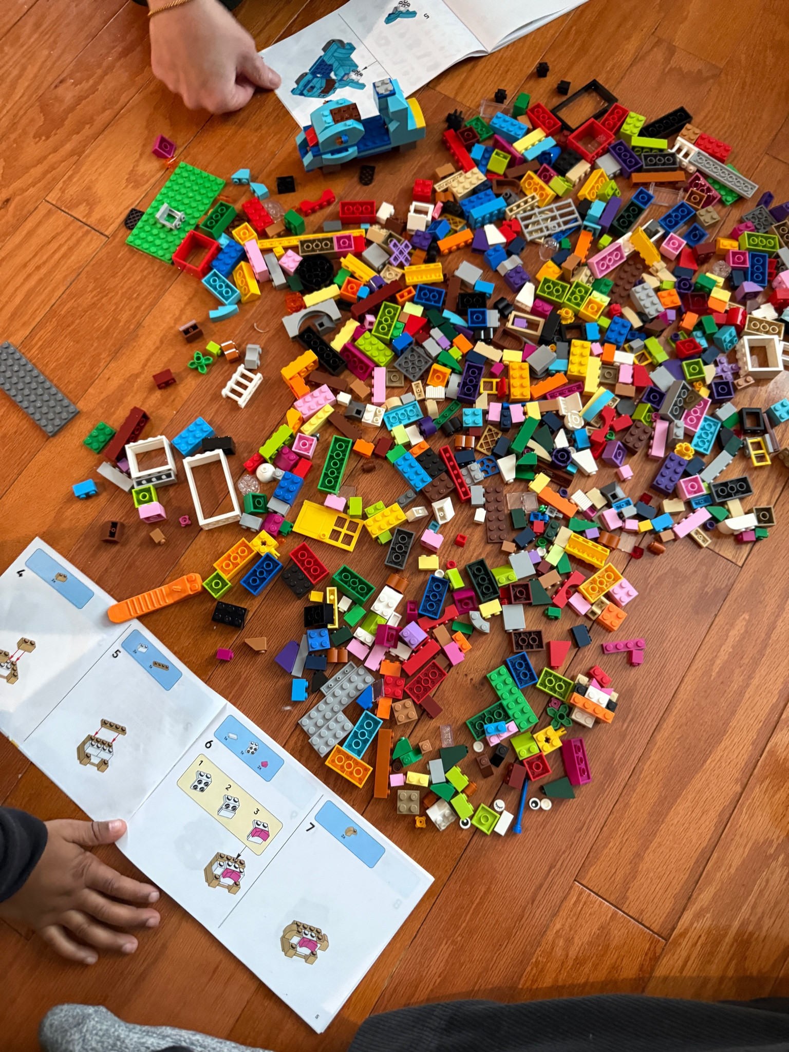 This #legoset is a hit!  Today’s builds: blue scooter, excavator and bricks, and a two story house with a chimney, flower bed, and mailbox🙌🏽🙌🏽 under $30!! 

#LTKFamily #LTKKids #LTKFindsUnder50