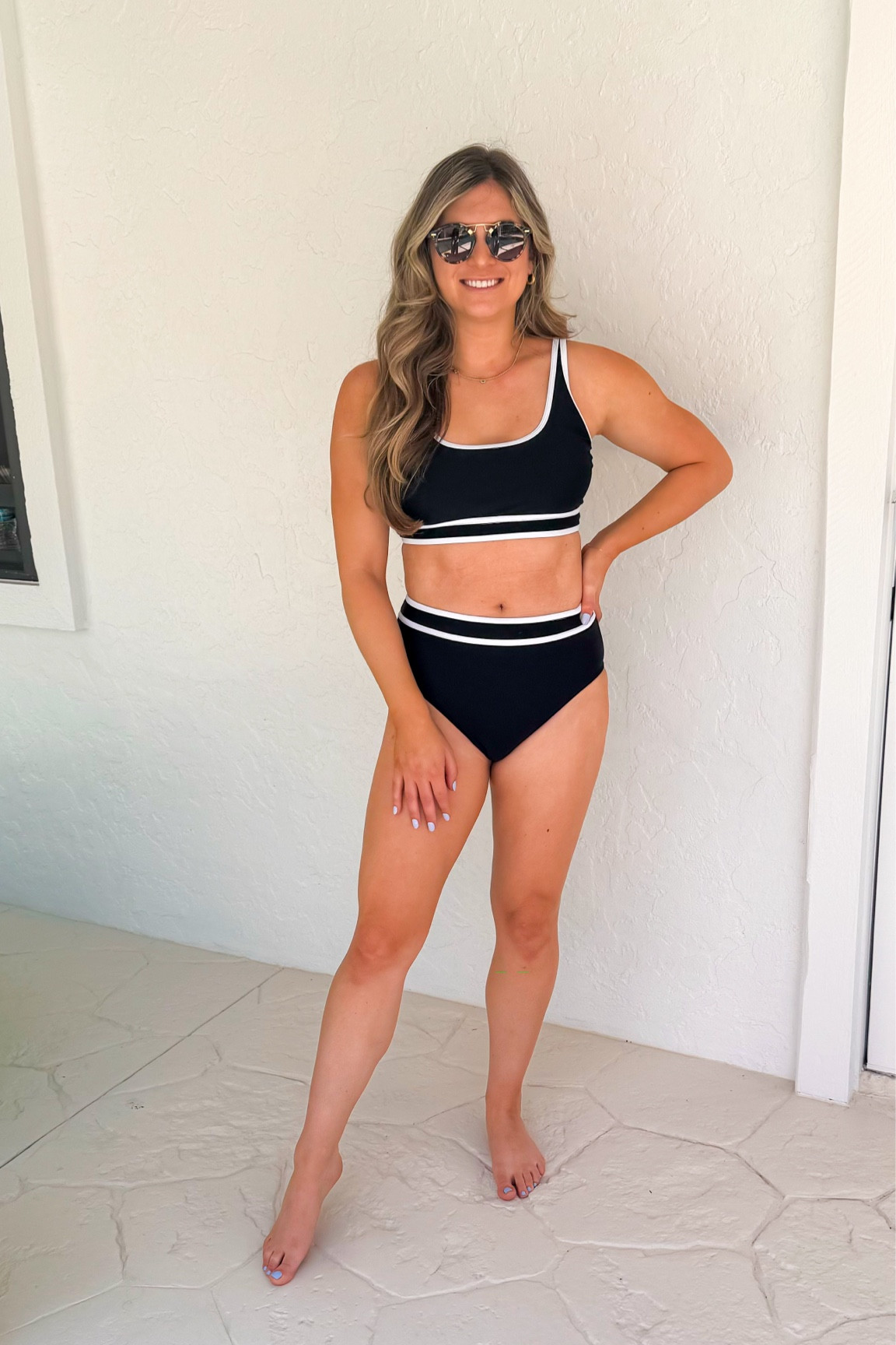 Black and white swimsuit from Amazon 
High waisted swimsuit sporty full coverage and everything stays put
Adjustable straps 
Super comfortable 
Krewe sunglasses similar on Amazon St. Louis II

#LTKfindsunder50 #LTKswim #LTKActive