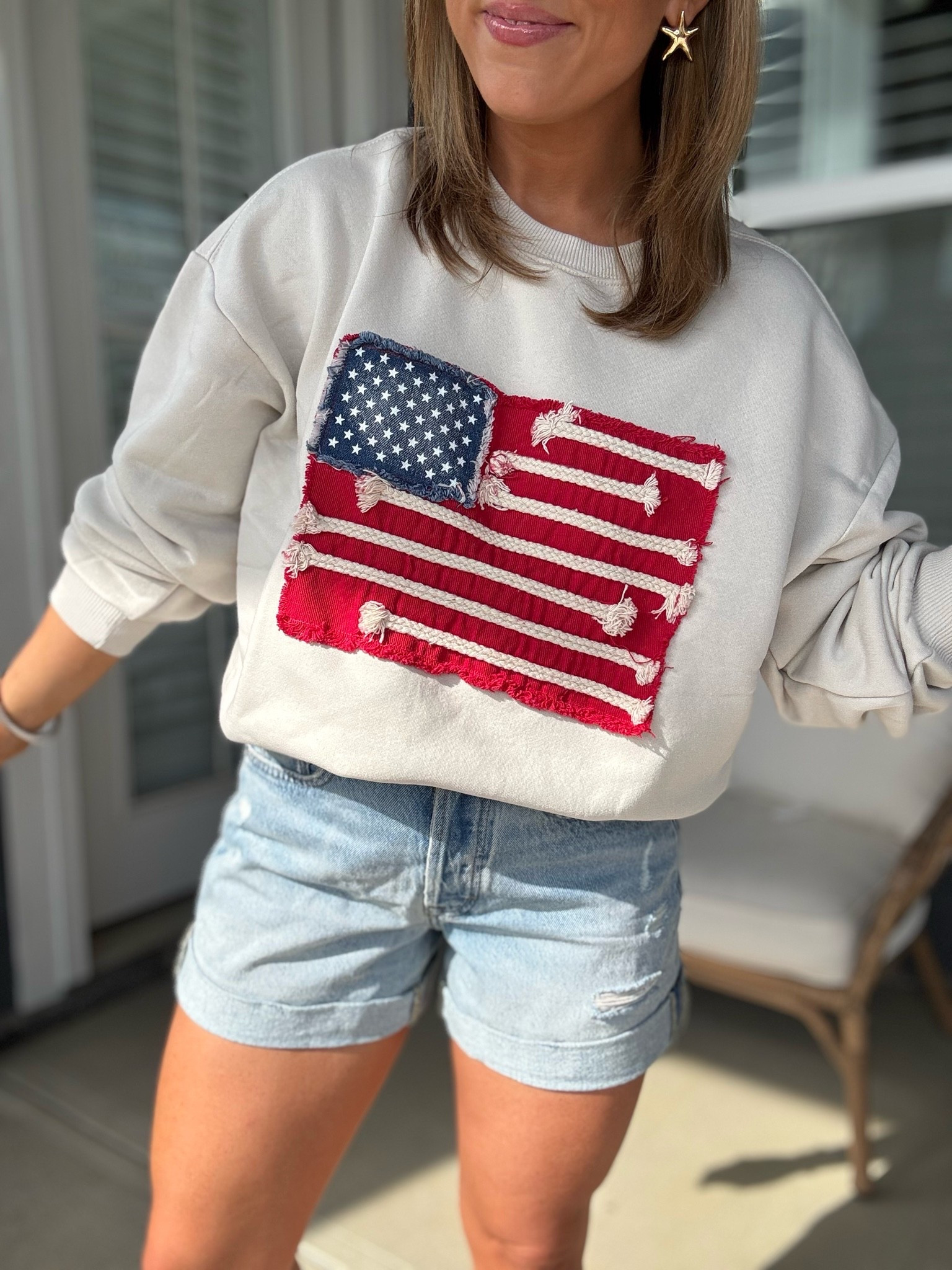 Red, white & TOO cute ❤️🤍💙 This Target Americana sweatshirt is officially RESTOCKED and it’s even better in person 😍 I cannot get over the denim patchwork + rope flag details… it gives such a high-end boutique vibe while still being an affordable Target find! Perfect for Memorial Day, Fourth of July, summer nights, lake weekends, concerts, or just everyday casual mom style 🇺🇸✨

Paired it with these Target denim shorts and the fit is SO good! They’re flattering, comfortable, and the perfect easy summer denim. Both pieces run true to size! I’m wearing the XS in the sweatshirt and a size 2 in the shorts 🤍

Target fashion has been absolutely crushing the Americana trend this year and these pieces are definitely going to sell FAST 👏🏼

#targetstyle #targetfashion #targetfinds #targetnewarrivals #americanastyle #fourthofjulyoutfit #memorialdaystyle #summerstyle #casualsummeroutfit #everydaystyle #denimshorts #patrioticstyle #targethaul #momstyle #affordablefashion #summeroutfitideas #ootd #targetdoesitagain

#LTKootd #LTKSeasonal #LTKPetite