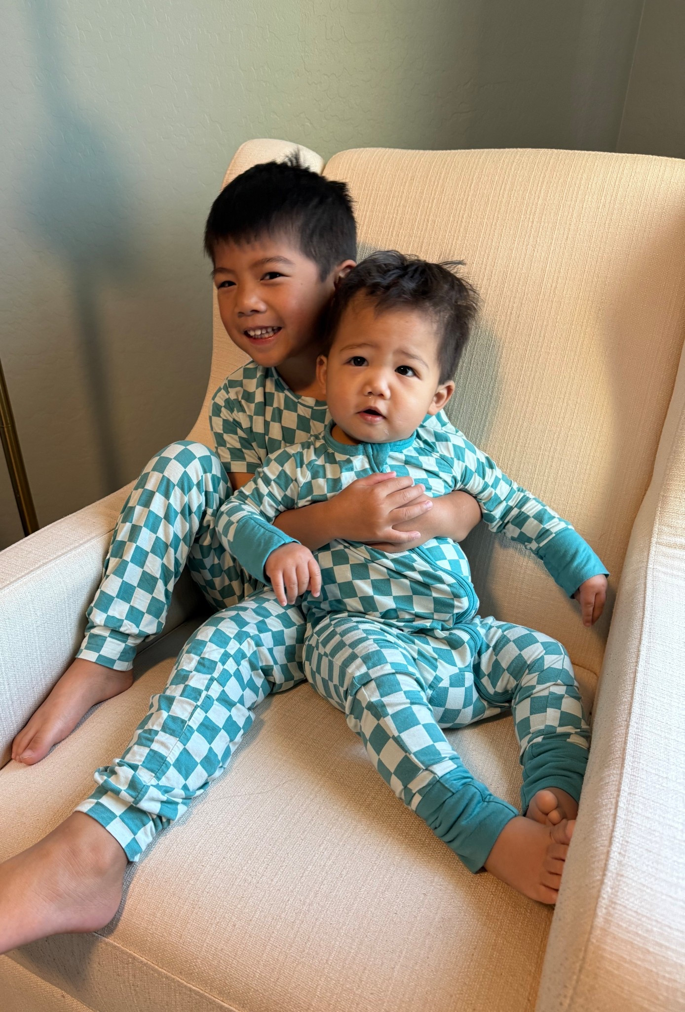I’m obsessed with these matching family PJs. The turquoise checkered print is so fun, and the bamboo pajamas are incredibly soft and stretchy. I also have a matching set for a mommy and me moment, and my kids get a kick every time we get to wear our matching pajamas.

Sizing:
Theo: 5/6T (TTS)
Miles: 12-18m (TTS)
Me: XS (TTS)

#LTKBaby #LTKKids #LTKSaleAlert