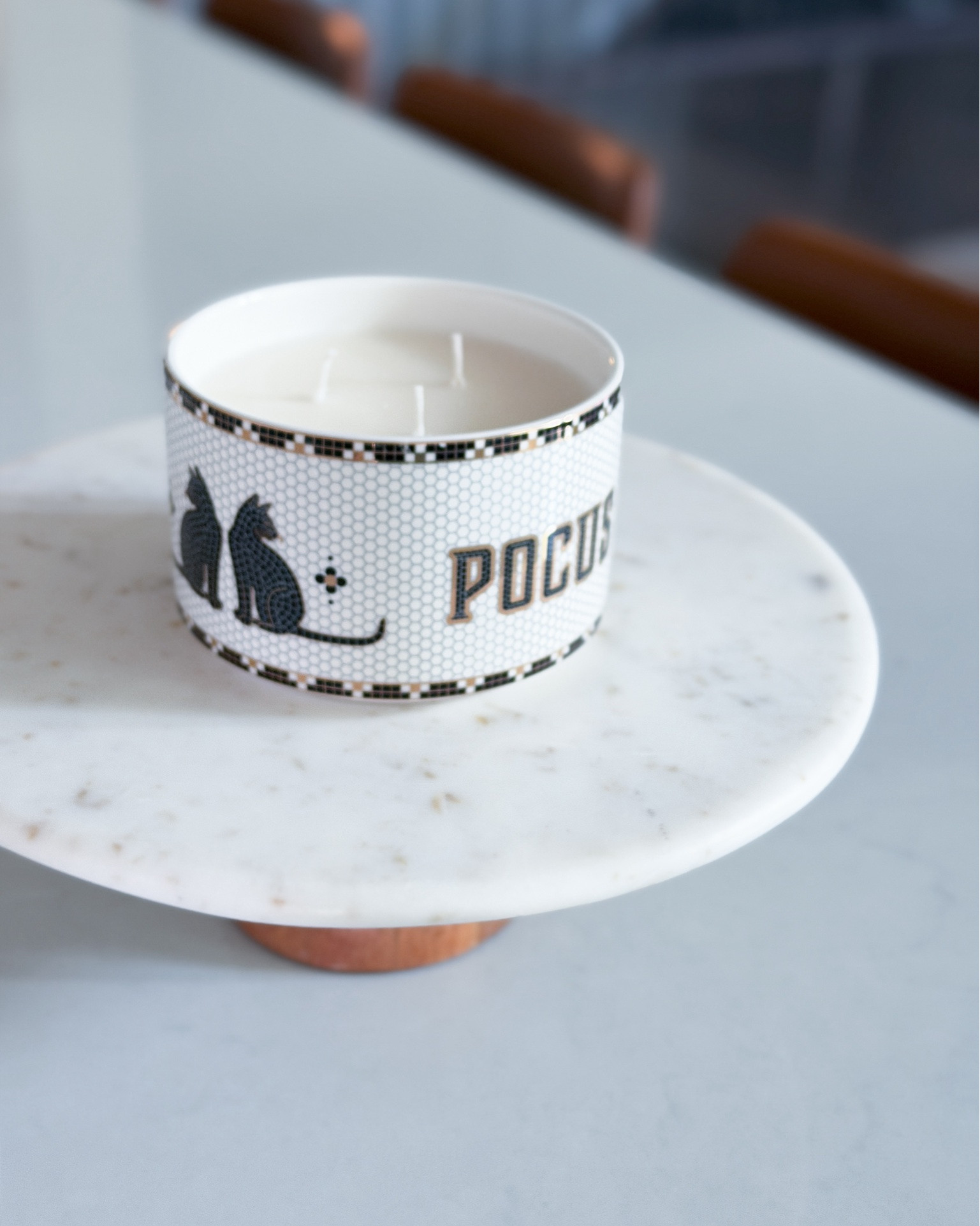 The cutest little touch of spooky season. My new Anthropologie Hocus Pocus candle is almost too pretty to burn. The vintage-inspired details + little black cats have me obsessed. 🐈‍⬛ 

Anthropologie Halloween - Hocus Pocus candle - Anthropologie candle - Anthropologie home decor - Halloween home decor - Halloween decorations - spooky season decor - spooky home decor - fall home decor - fall decorating ideas - Halloween candle - fall candle - black cat decor - vintage Halloween decor - aesthetic Halloween decor - neutral Halloween decor - cozy fall decor - Halloween kitchen decor - Halloween coffee table decor - Halloween hostess gift - fall hostess gift - Halloween gift ideas - spooky season finds - fall home finds - Halloween 2026 - Anthropologie finds

#LTKSeasonal #LTKHome #LTKdayinmylife