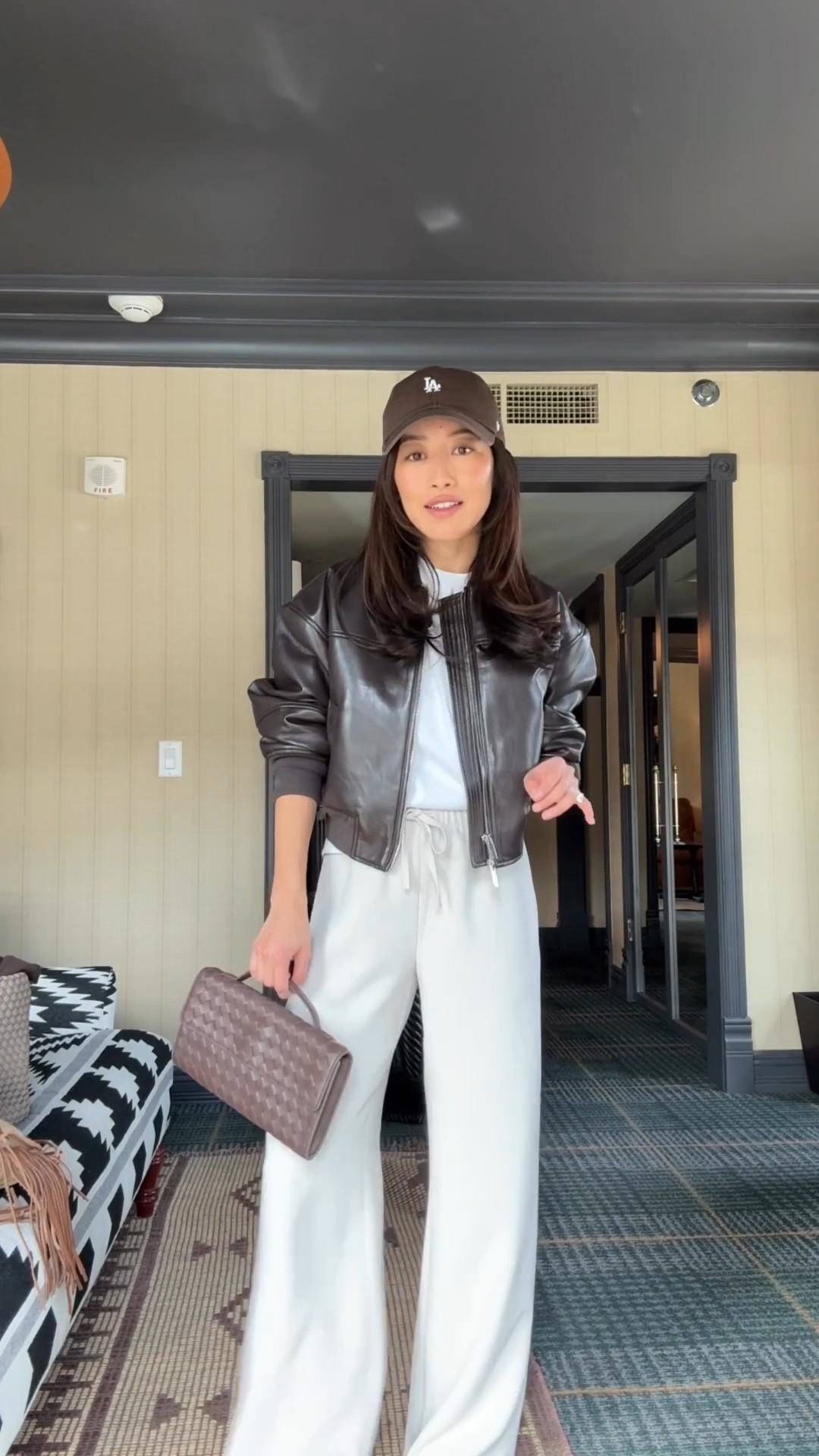 Sizing info below and linked a similar jacket for less

• Lodge pants 2XS short - runs long for petite. If you’re very short you are better off getting any length and hemming them. pull on elastic waist, wrinkle resistant, and beautiful drape.

• Aritzia faux leather jacket 2XS got this over a year ago with no issues. this is a more structured, edgier cut jacket that I always feel chic in and love for school drop off, running errands

• Madewell boxy oversized tee xxs bigger fit shorter length

• Sam Edelman slingback kitten heels 5.5 size up if between sizes since toe can be a little narrow 

• Quince handwoven top handle clutch 

• 47 brands hat from Anthropologie 

#LTKTravel #LTKPetite #LTKootd