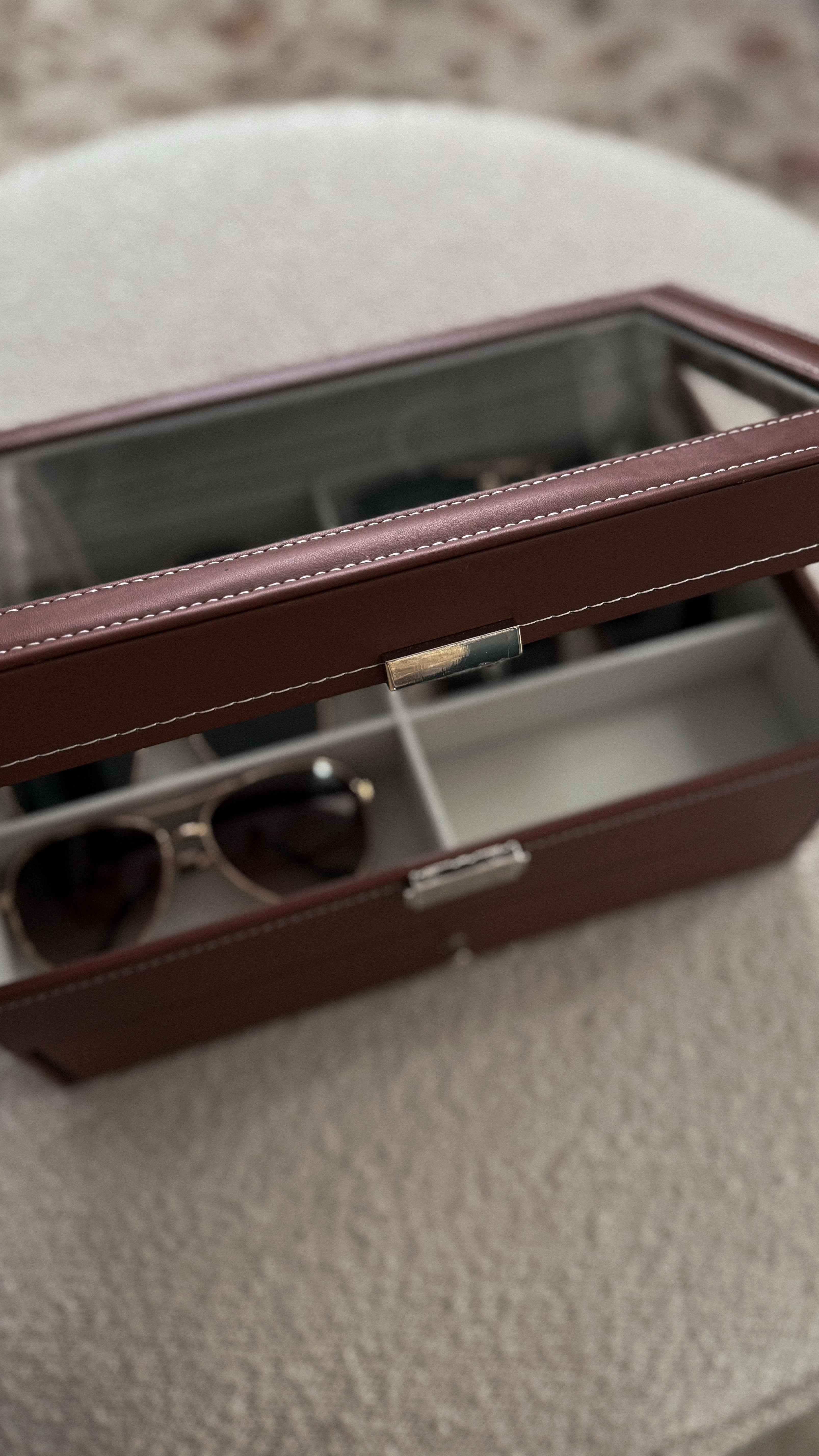 I got the most chic new sunglasses storage box!  It’s a really pretty dark espresso leather, and I love that it comes with a bottom drawer and a see-through panel on top!  Now we have an excuse to buy more sunglasses! Sorry, husband 😂😎 #storage #storagesolutions #organizing #organization #sunglasses #amazonfinds #amazon

#LTKStyleTip #LTKHome