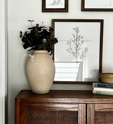 Picked up this beautiful Studio McGee vase from Target and it’s elevating this little corner so much! And it will be perfect for some fall stems soon. 

Wooden curio storage cabinet
Two-handled tall vase

#LTKSeasonal #LTKhome #LTKunder50