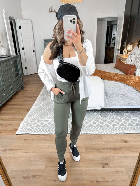 Spring Athleisure Outfit 🖤

Tank — small
Button Down — medium
Joggers — small

Athleisure fashion | athlerosure outfits | athleisure style | comfy casual spring outfit | spring style | spring running errands outfit | spring fashion | platform adidas sneakers outfit spring | black and white sneakers | oversized white button down outfit | olive green activewear joggers outfit | Sherpa belt bag outfit 

#LTKstyletip #LTKfindsunder50 #LTKfindsunder100