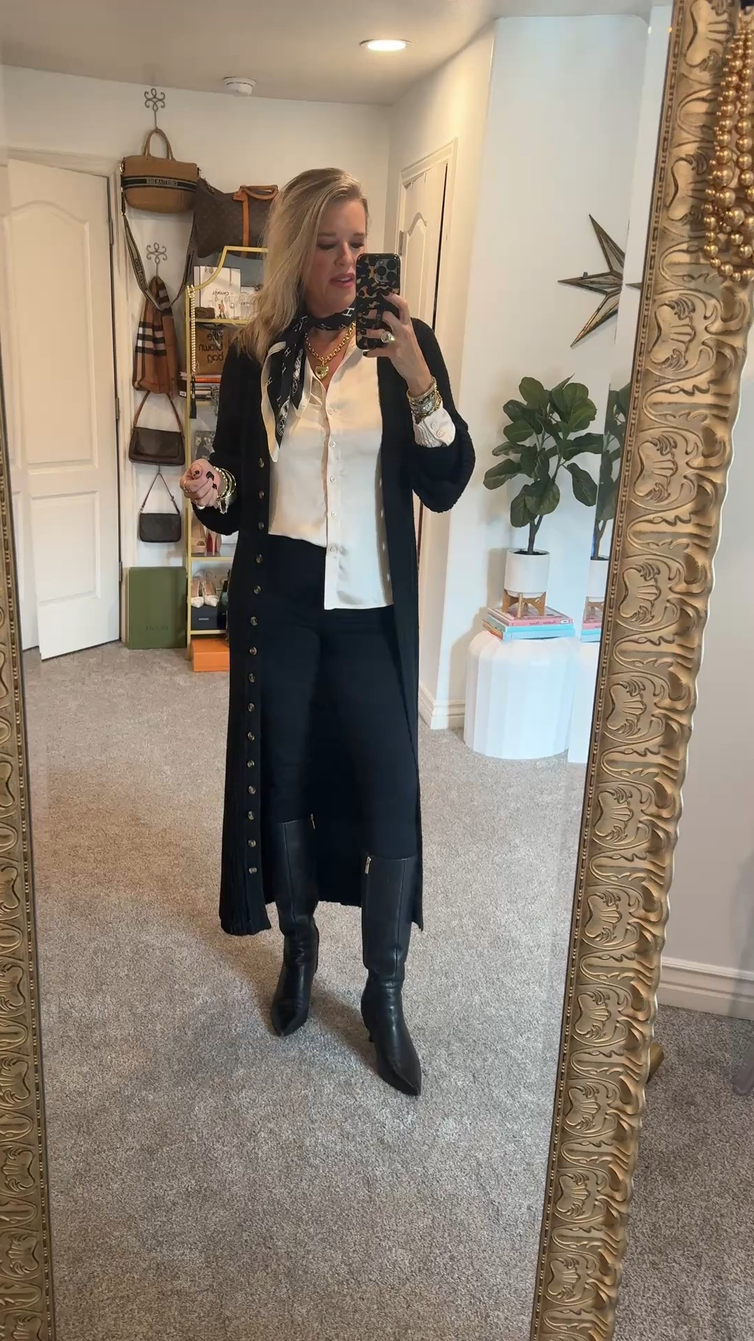 It’s sweater cardigan/duster season✔️

A chic way to style an affordable long sweater duster. Amazon find  fits tts in a med 

Satin button up blouse Chicos fits tts in a Chicos 0

Spanx black skinny jeans perfect for tall boots, fits tts in a med 

Tall leather boots by Frankie 4 

Sunnies are a cool Amazon find 2for $17 

Hermes scarf not likable with link similar 

Gold jewelry by Allie and Bess save 20% with my 

#LTKOver40 #LTKFindsUnder100 #LTKWorkwear