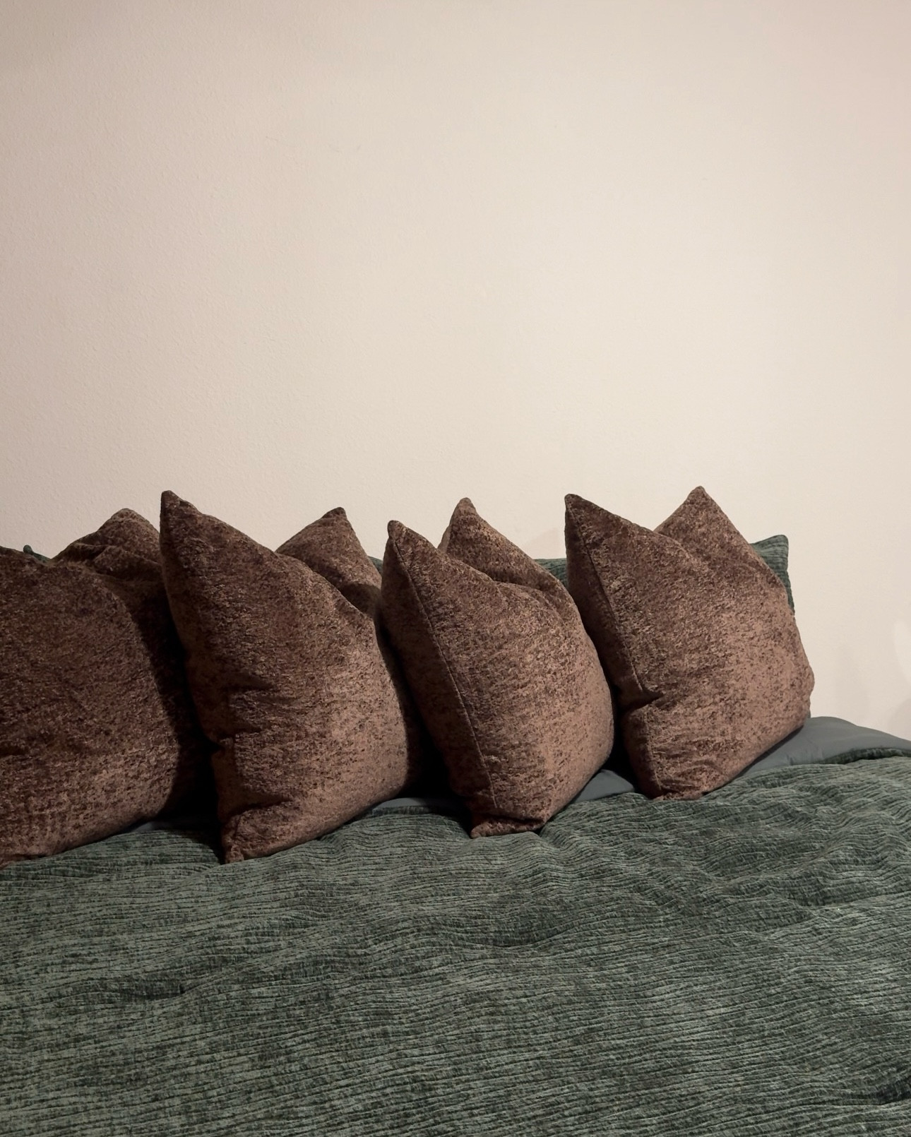 I found my exact pillows in-store (HomeGoods) with inserts, but these velvet chocolate brown covers are the closest dupe I could find online. Same rich tone, same luxe feel. Mine are 26x26 — these are 24x24.

#LTKFindsUnder50 #LTKHome