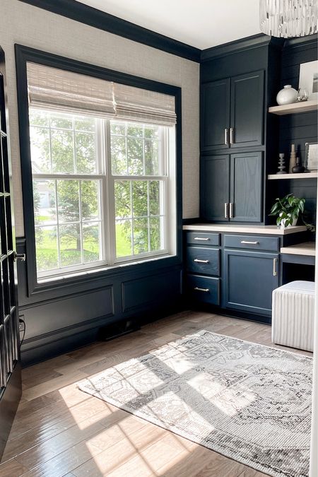 Home office decor 

Built in cabinets: stock cabinets from Lowe’s
Counter : butcher block countertops
Paint color : Valspar Chimney Smoke 

Moody office,  home office storage, office built ins, Target rug , bamboo shades 

#LTKstyletip #LTKhome #LTKFind