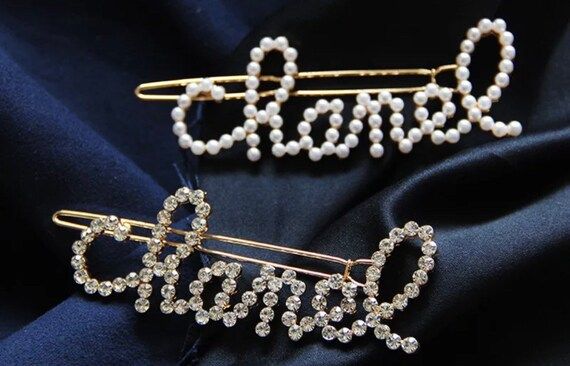 Read the full title
    Pearl or diamond designer hair clip | Etsy (US)