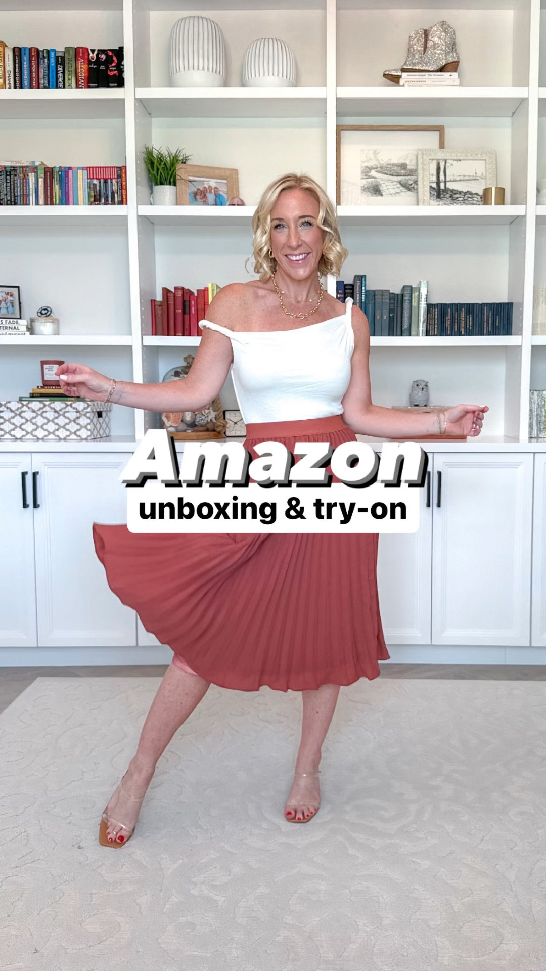 Amazon unboxing:
1. & 2. Asymmetrical off the shoulder tank - size small.
• jeans - size 25.
3. Pleated skirt - size small.
4. Satin tie strap dress - size small.
5. 2-piece lounge set - size small.
6. Flowy maxi dress - size small.
• white long sleeve shirt - size small.
7. Sweater 2-piece skirt set - size small.
• jean jacket w/pearl embellishment - size small.
8. Pleated halter dress - size small. 

#LTKVideo #LTKSeasonal #LTKFindsUnder50