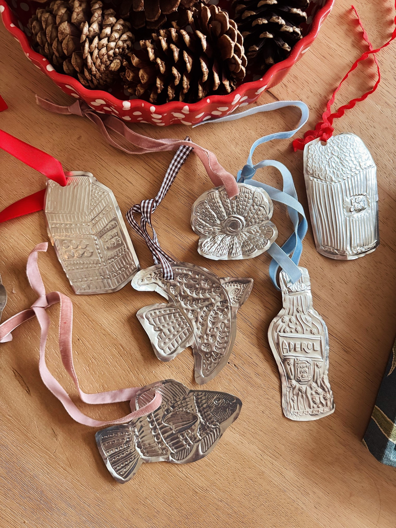 embossed tin ornaments, made from recycled takeout containers!

#LTKHome #LTKHoliday