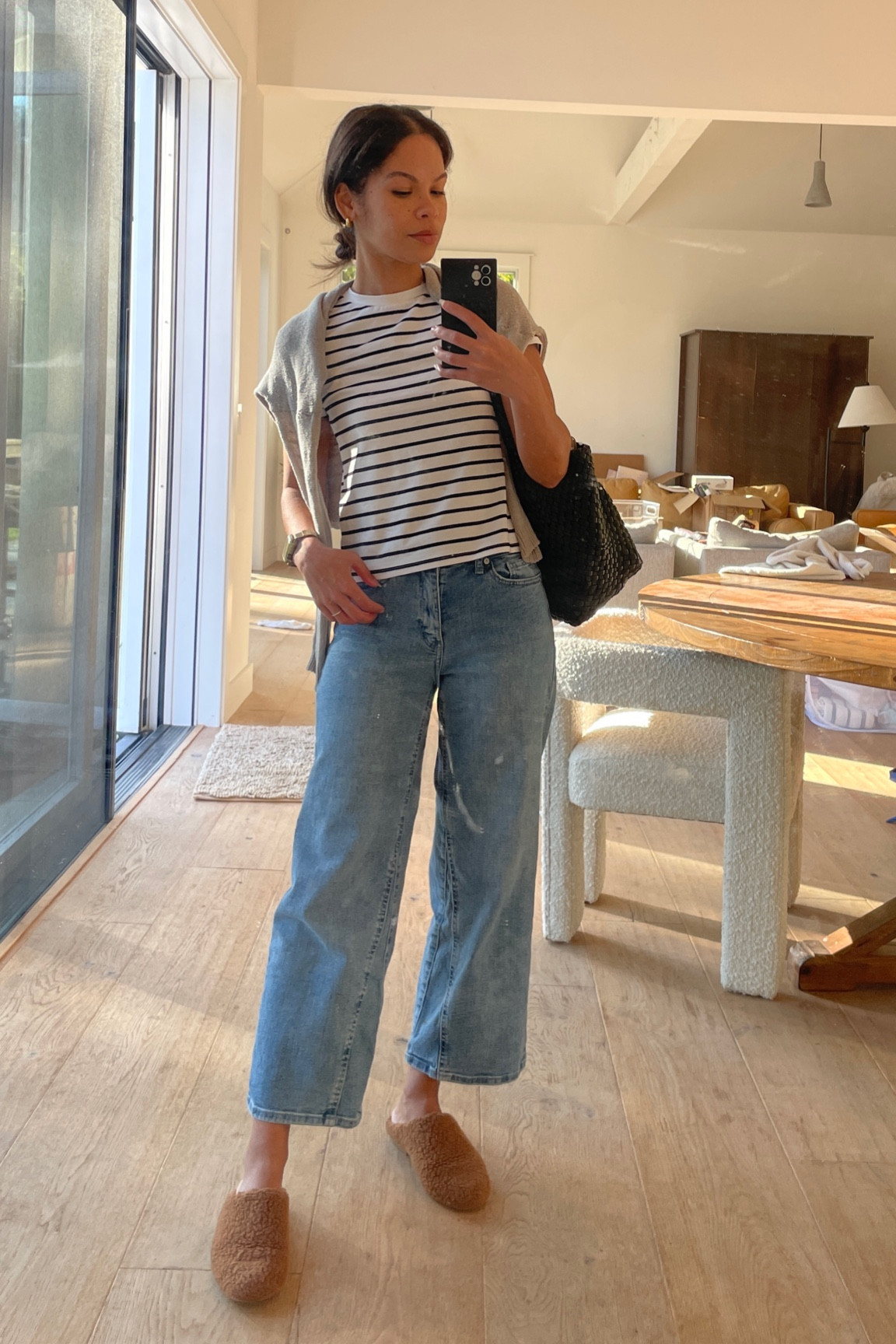 Love this 2-pack of tees (for $10!) they’re girls sizing, I’m normally a XS-S and wearing a size 12-14 - they go up to a girls 20! 

Relaxed fall casual outfit striped tee jeans sweater shearling mules