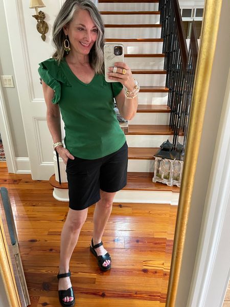 These J Crew Factory 9 inch walking shorts are perfect! They are a more tailored look and not a wide look that typical walking shorts have. True to size in an 8 paired with this fun ruffled tee from Chico’s in a 0. Cole Haan Zerogrand walking sandal took me all over France last summer! #colehaanzerogrand #walkingsandal #walkingshort #chicos #jcrew 

#LTKsalealert #LTKstyletip #LTKSeasonal