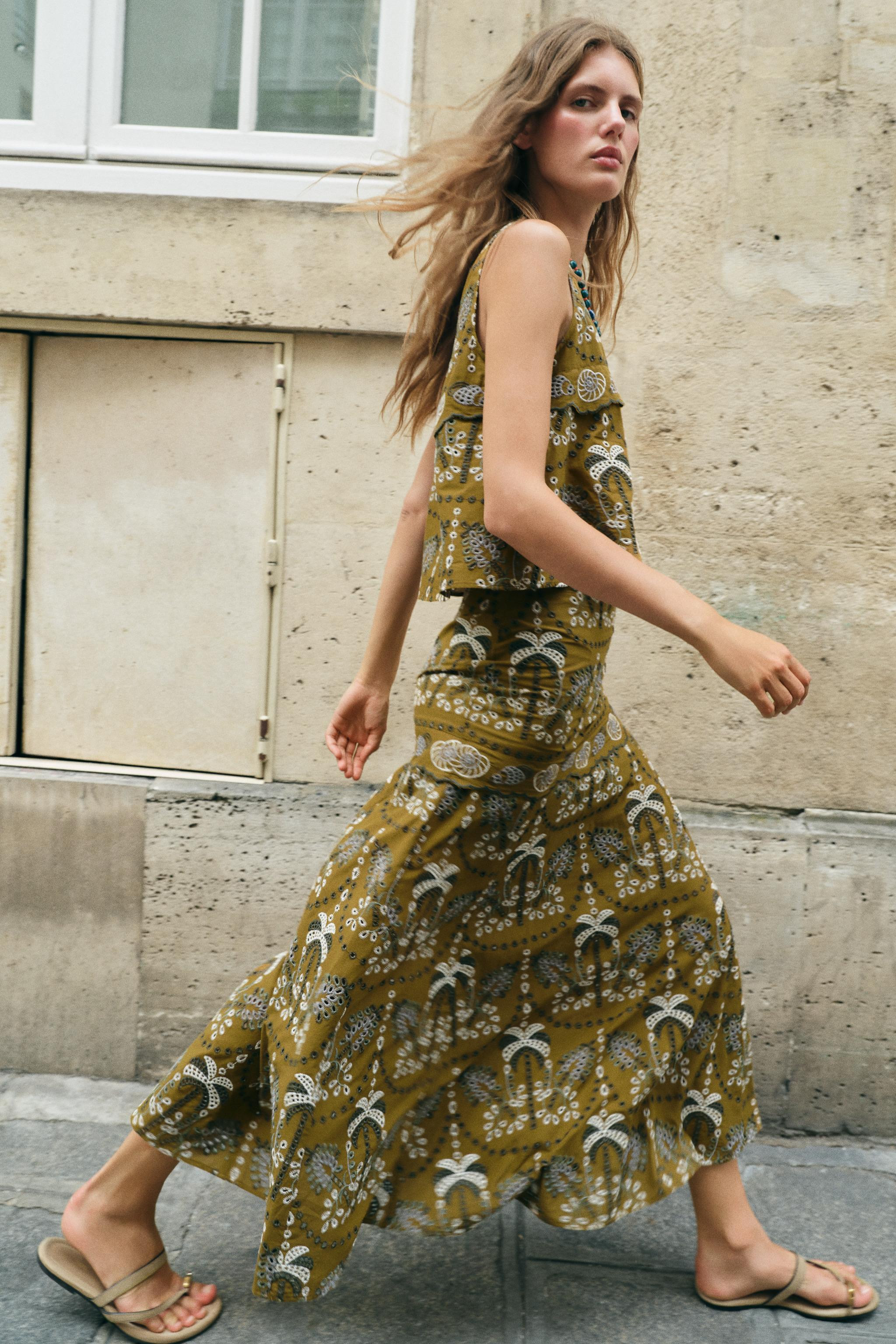 High-waisted midi skirt. Embroidered eyelet detail. Short interior lining. A-line hem. Side hidde... | Zara US