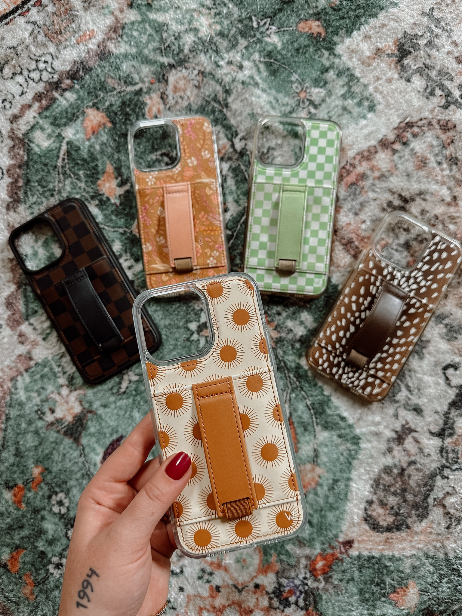 CODE JAZ TO SAVE! How adorable are all my phone cases from Walli Cases?! The finger strap makes it so easy to hold your phone and can be propped up! The highest quality! Newest phone case to my case family is this adorable boho sun! Code JAZ to save at checkout! #wallipartner #wallicases #mywallicase perfect Christmas gift idea! 

#LTKsalealert #LTKHoliday #LTKGiftGuide