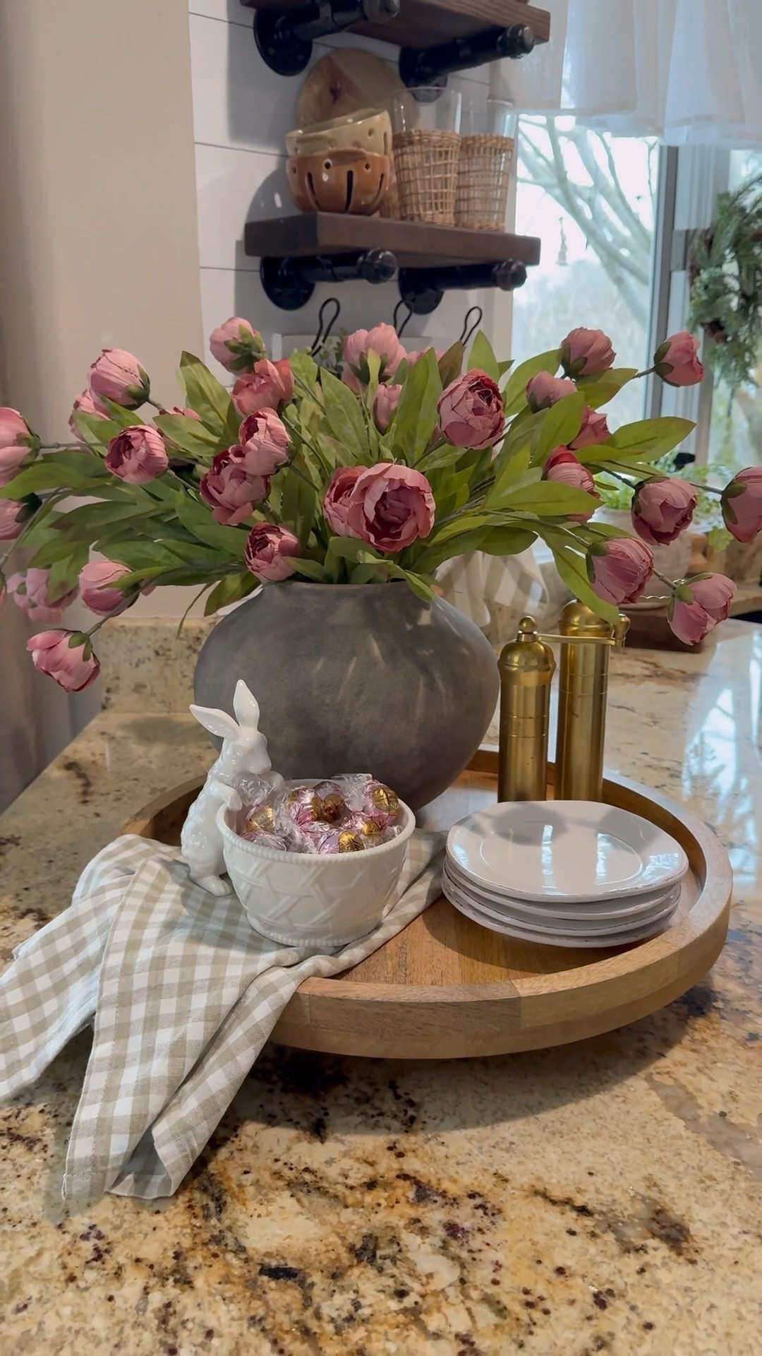 Simple Spring Centerpiece Idea

Follow @farmtotablecreations on Instagram for more home inspiration.

If you’re looking for an easy way to bring a little spring into your kitchen, a simple centerpiece like this is one of my favorite styling tricks. A large wood tray that doubles as a lazy susan anchors everything while soft florals, neutral dishes, and a few decorative accents create a layered look that feels fresh but still cozy. The pink peonies add just the right pop of color while keeping the overall palette warm and neutral.

12 stems in vase.

#traydecor #kitchendecor #tabledecor #counterdecor #amazonhome #amazondecor #amazonfinds #amazonmusthaves #springdecor #springcenterpiece #kitchencounter #countertopdecor #woodtray #easterdecor #centerpiece

#LTKSeasonal #LTKHome #LTKSaleAlert