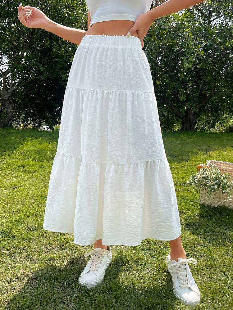 SHEIN X Xime Ponch Solid Layered Hem Skirt
       
              
              $17.99        
  ... | SHEIN