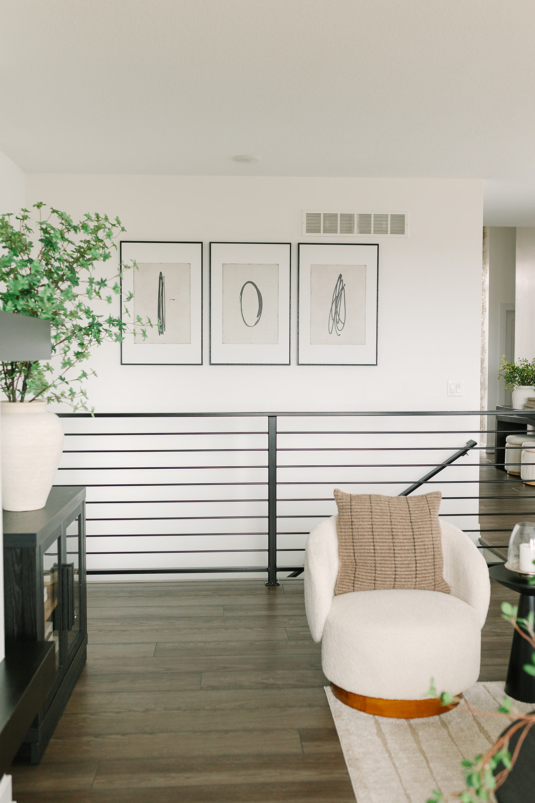 Okay this one is a statement 🤍 This three-piece art set completely transforms larger spaces and truly steals the show, especially paired with my swivel chair, vase, and stems to pull everything together. 

 

#LTKHome