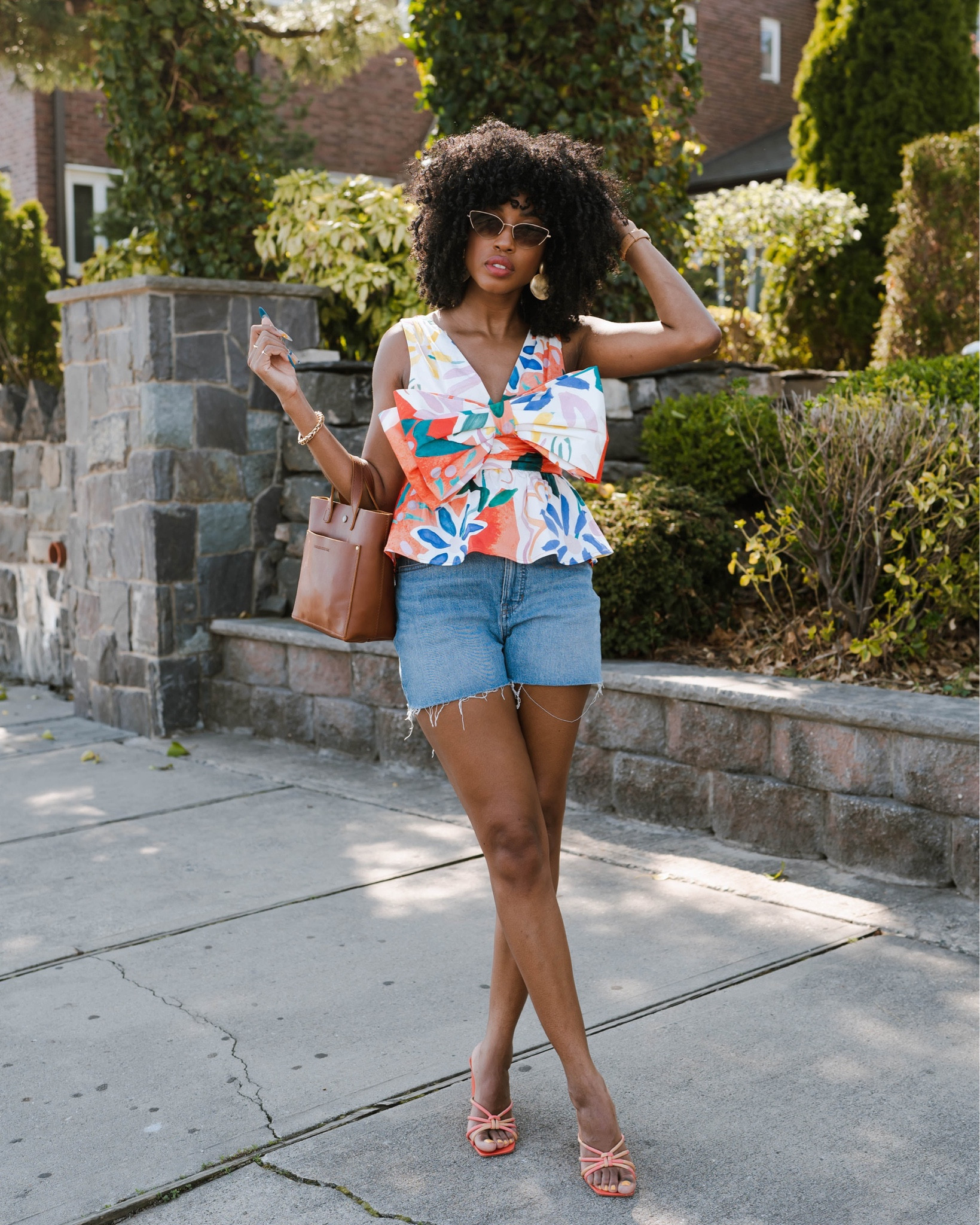 The colorful statement top of your dreams! I’m obsessed with not only the top but TTS fit of these shorts as well! A show stopping but fun look for the summer. 

#LTKSeasonal #LTKstyletip