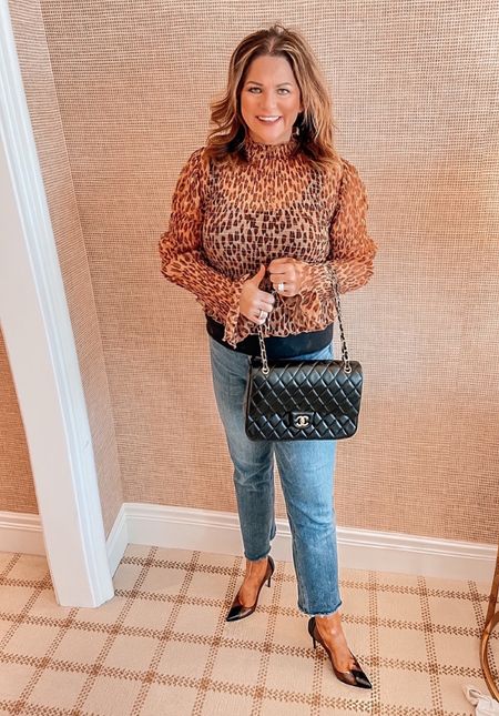 More leopard print! Because, leopard print is something that I can’t get enough of! 
This is the top I bought specifically to wear on Thanksgiving. I’ve worn it an additional 4x since then. It’s easily become my favorite top.

#LTKHoliday #LTKSeasonal #LTKstyletip