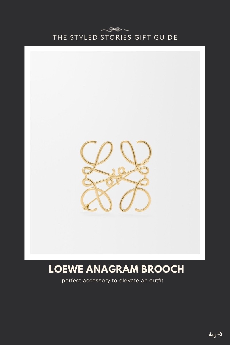 Shaped to resemble the brand's anagram, made from polished gold-tone brass. Timeless style and a statement piece. Size is 2” x 2"

#LTKHoliday #LTKGiftGuide #LTKWorkwear