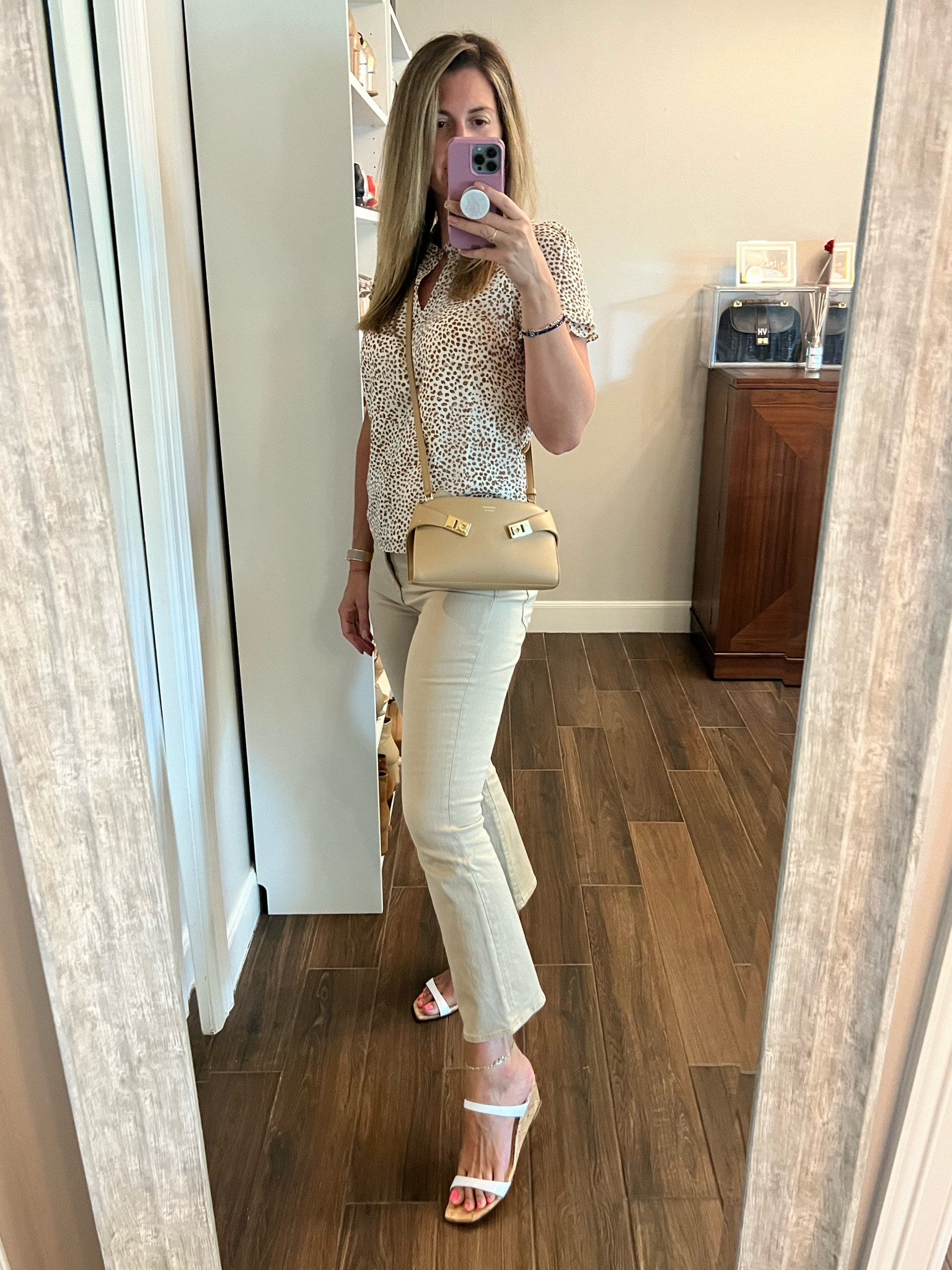 Keeping it neutral but fun with this animal printed blouse. Runs TTS. I’m wearing a size small. Now 40% off!

Cream and camel jeans are a must and a great alternative to white. These run small so I would size up. I’m wearing a 29. The ultra high rise are 🙌🏼 Linked a bunch of similar options. 

Wedges run TTS. Wearing a 9.5 (if you’re in between sizes size down.) On mega sale! 

#LTKFallSale #LTKItBag #LTKOver40
